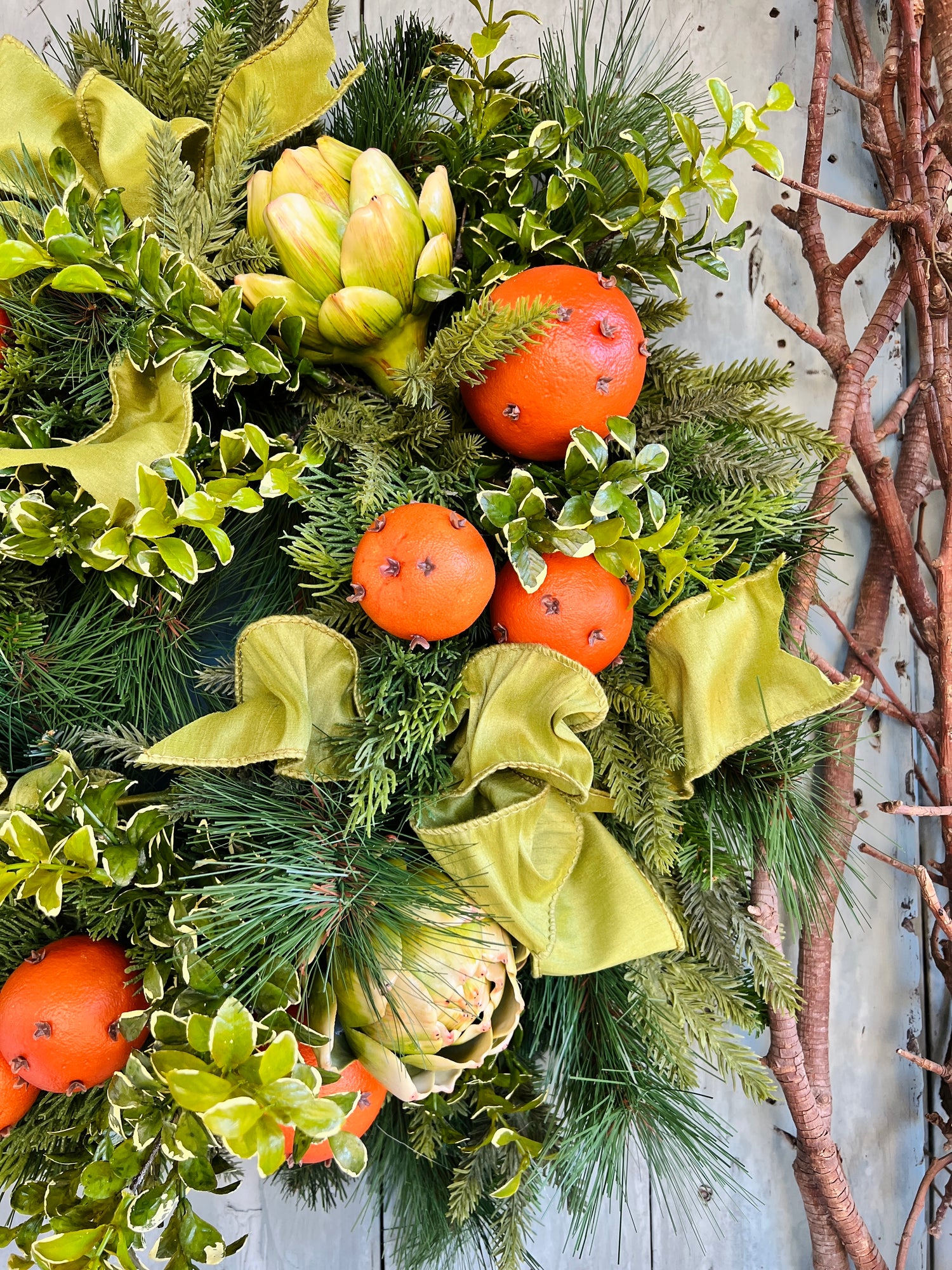 Orange pomander and artichoke wreath