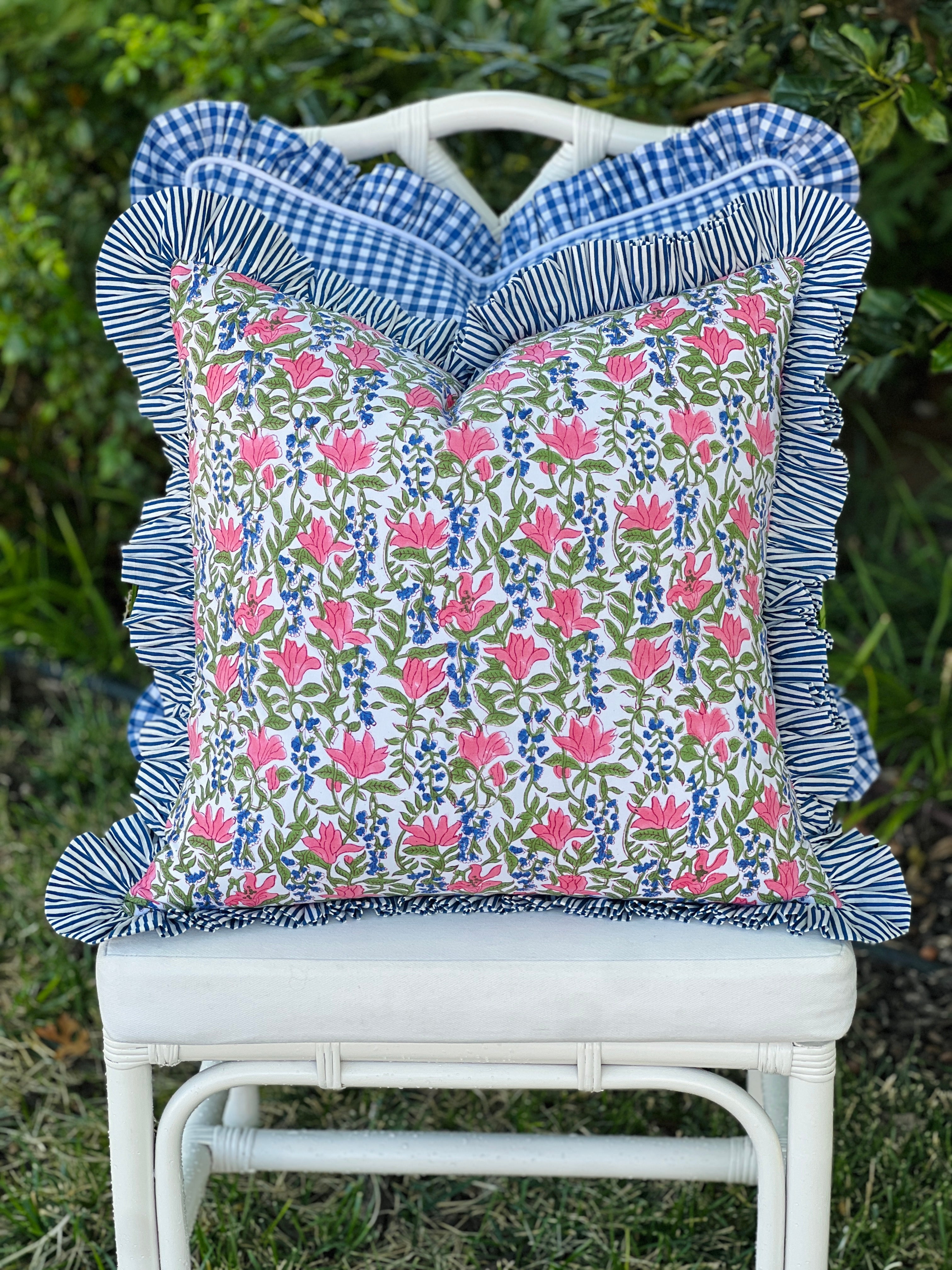 Blue, pink, and green floral pillow cover