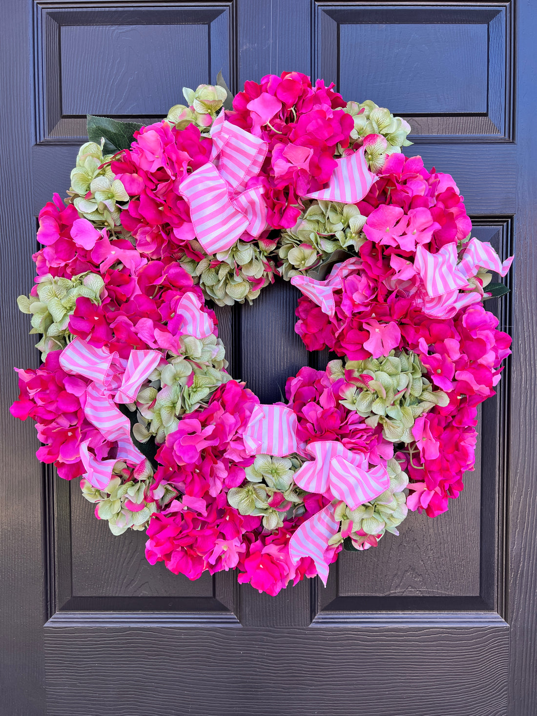Pink and green hydrangea wreath with optional pink striped ribbons