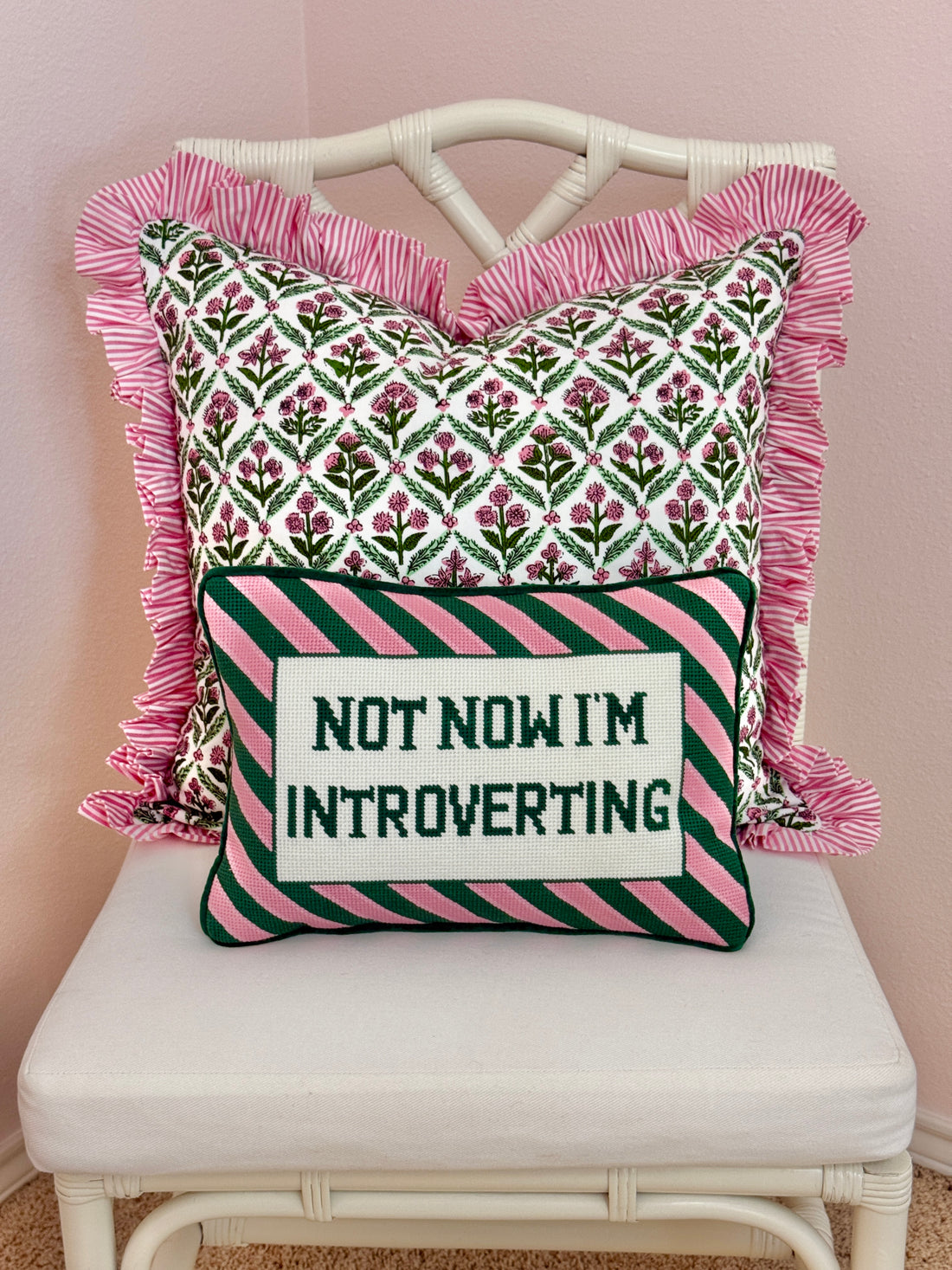 Needlepoint pillow, pink and green Introverting