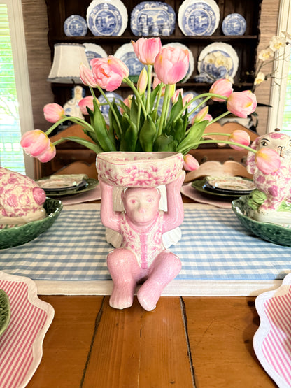 Pink porcelain chinoiserie monkey with lotus bowl