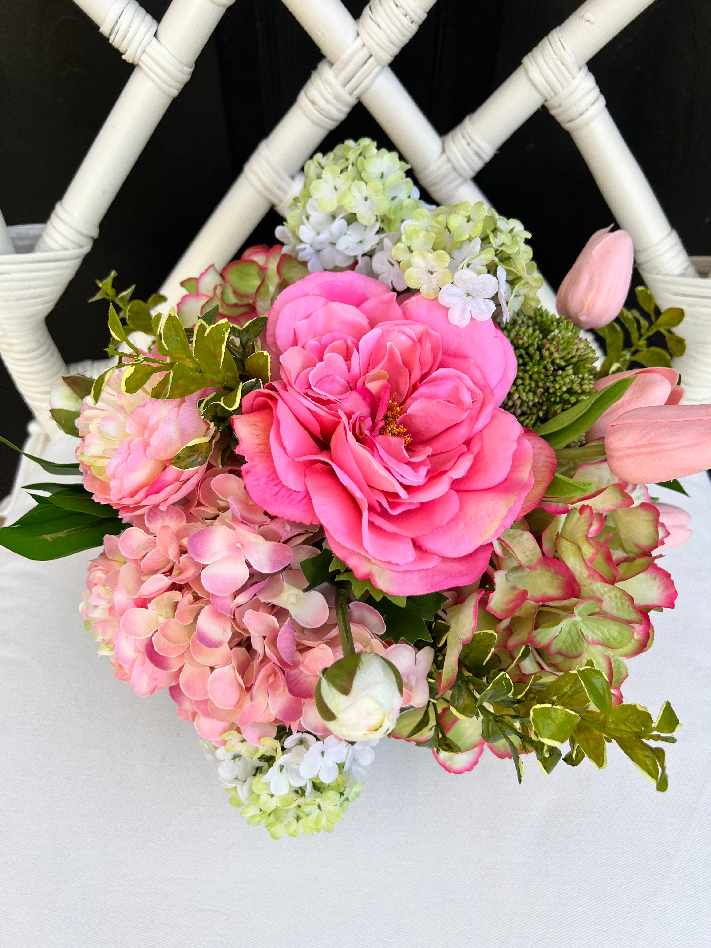 Pink and green Spring floral arrangement in chinoiserie footed bowl