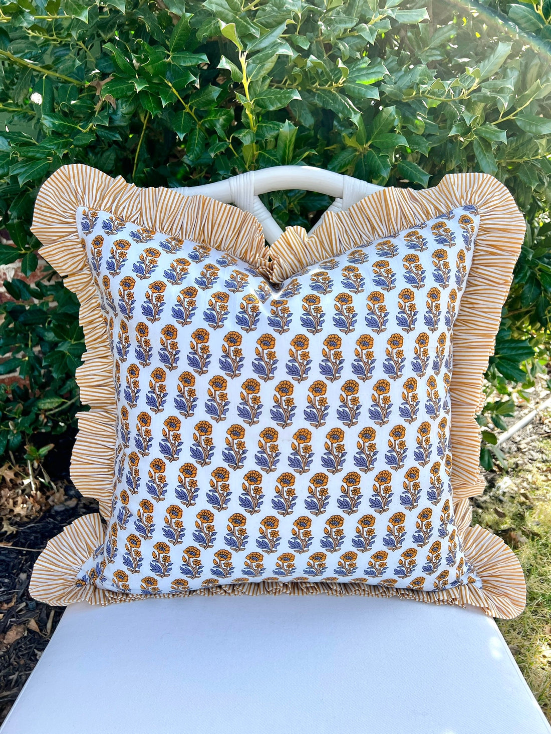 Yellow and blue floral block print pillow cover with ruffle trim