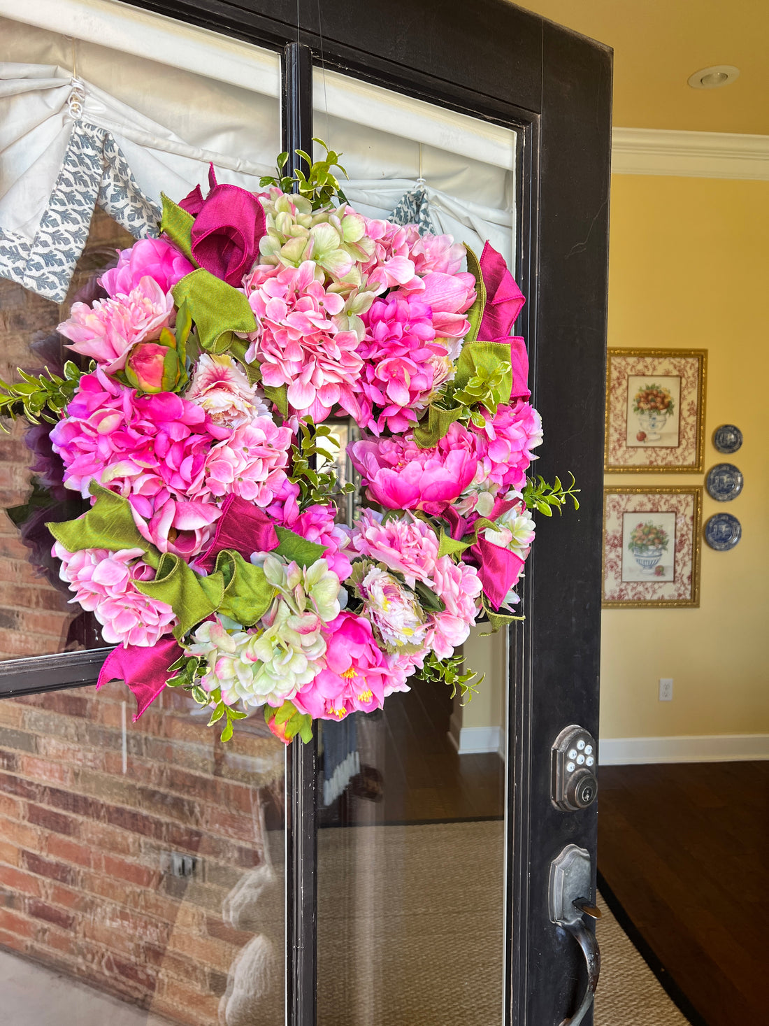 Spring pink and green hydrangea, peony, and cabbage wreath
