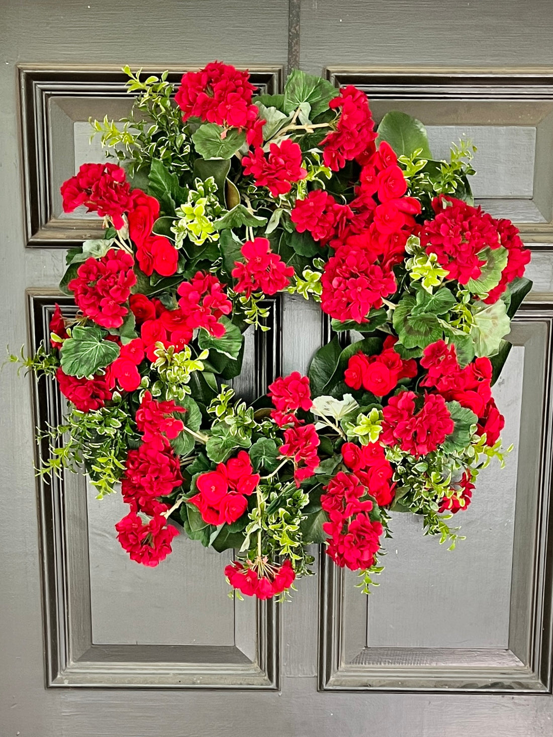 Red geranium and begonia wreath 30”