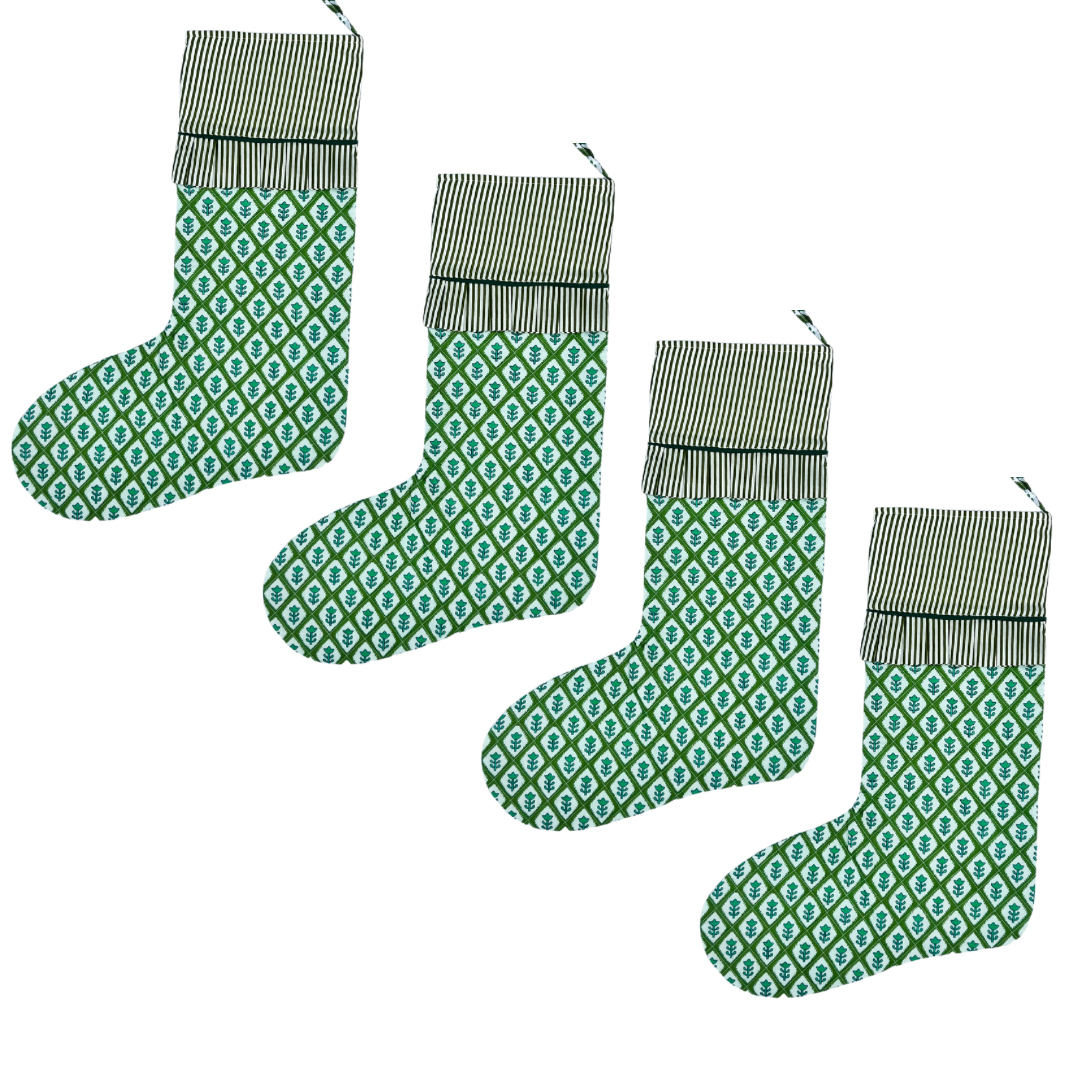 Green block print quilted stocking with ruffled trim
