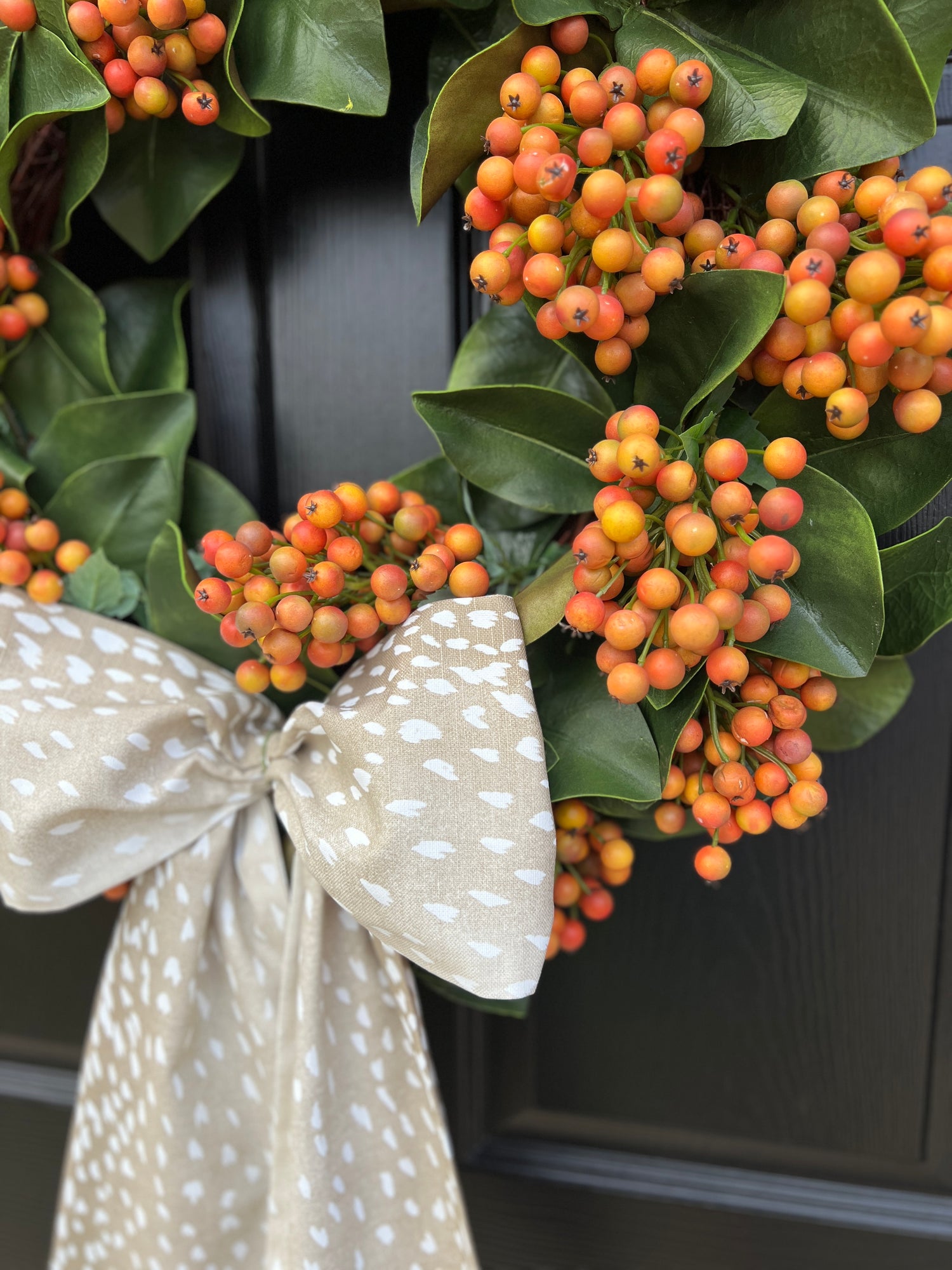 Fall berry and magnolia wreath