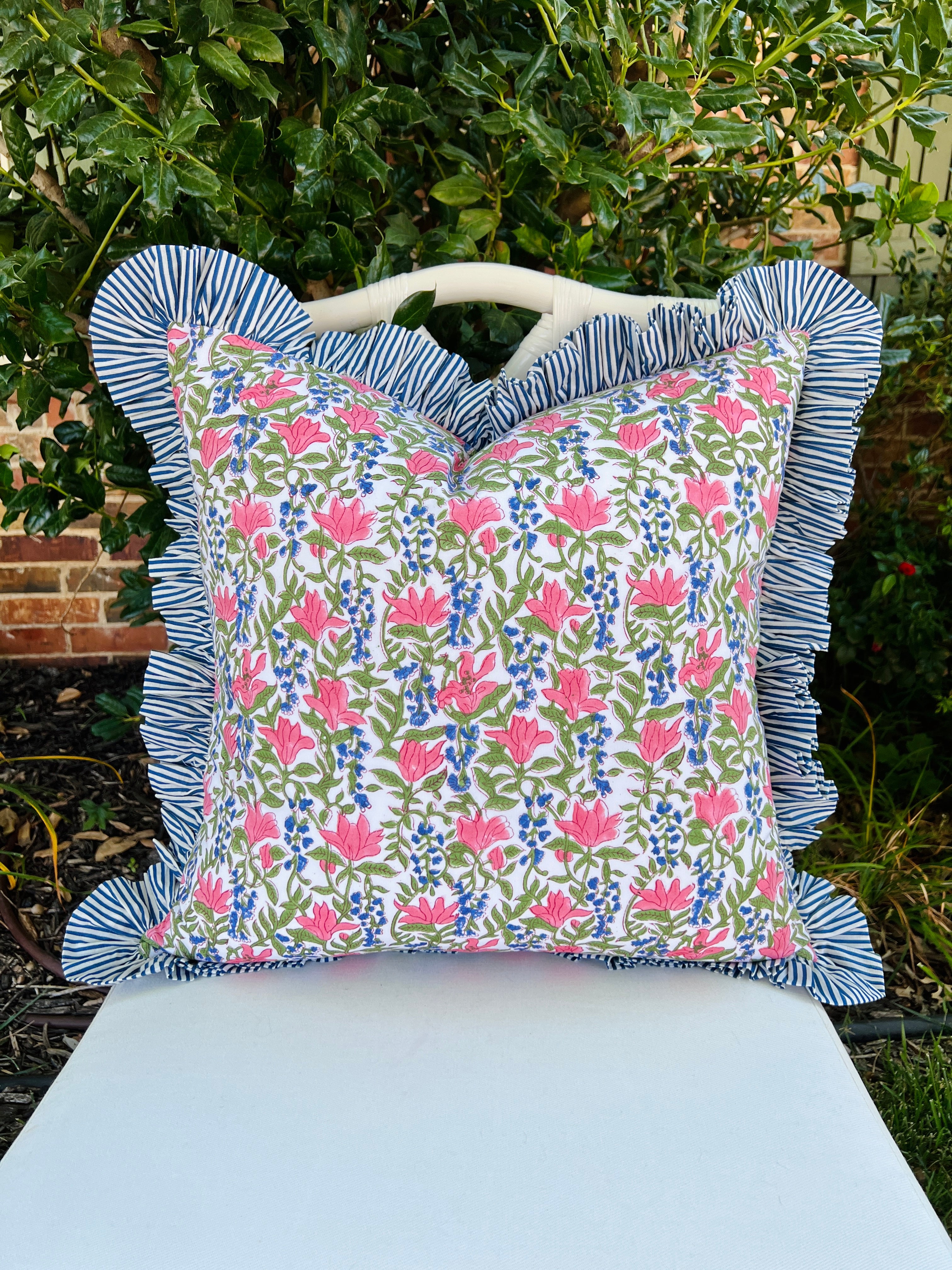 Blue, pink, and green floral pillow cover