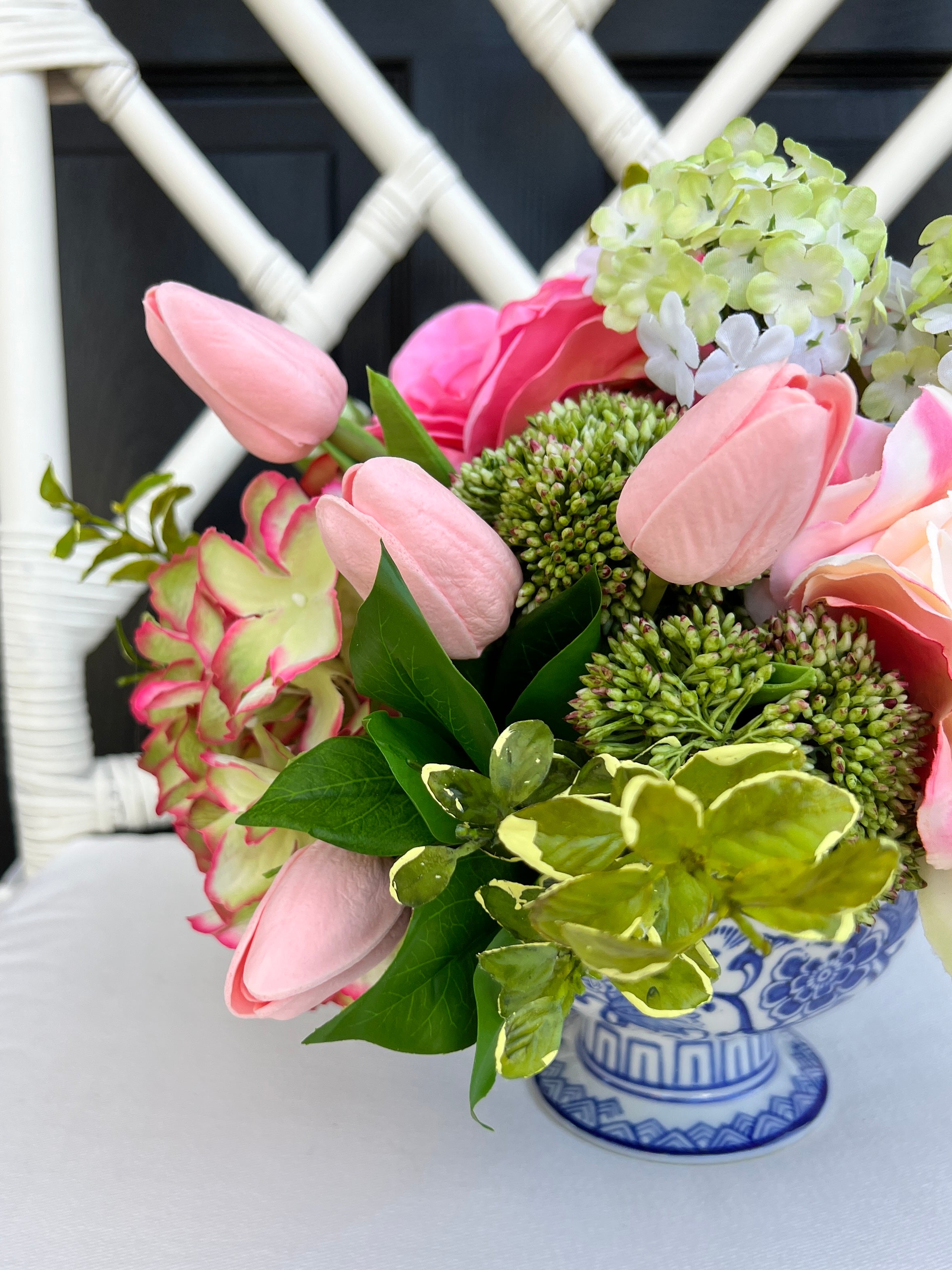 Pink and green Spring floral arrangement in chinoiserie footed bowl