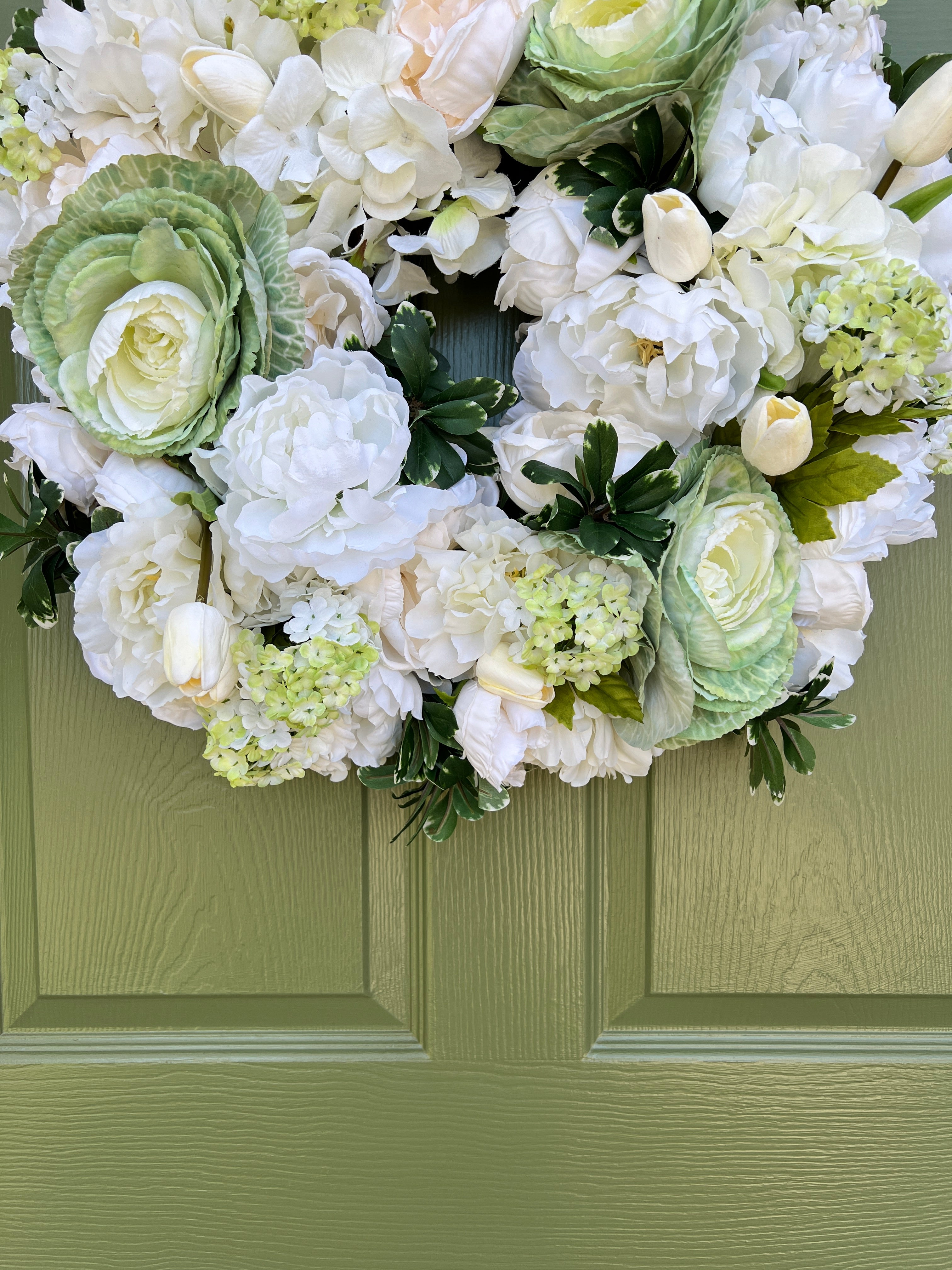 White floral and green cabbage wreath 22”