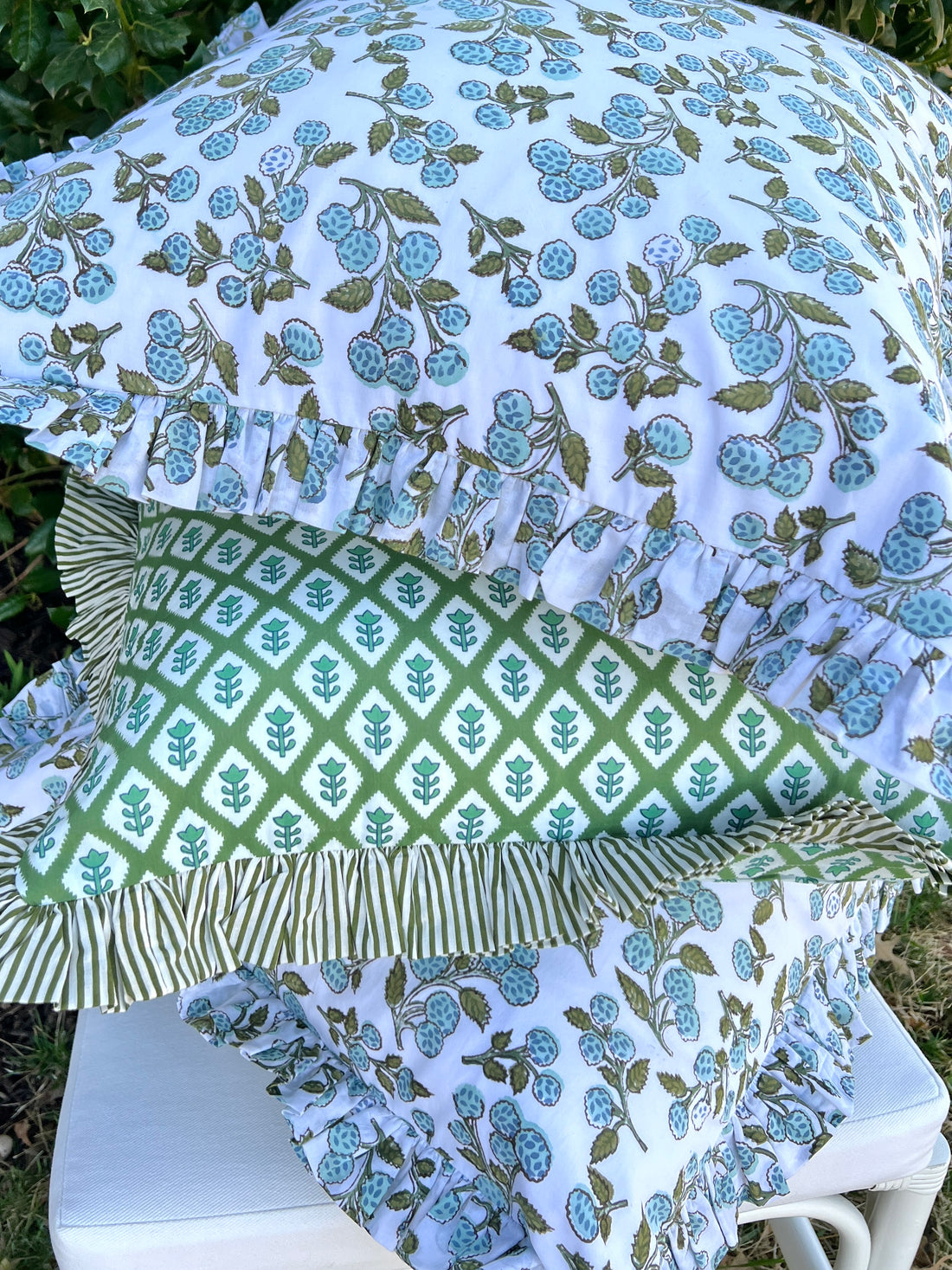 Light blue and green berry block print ruffle pillow cover