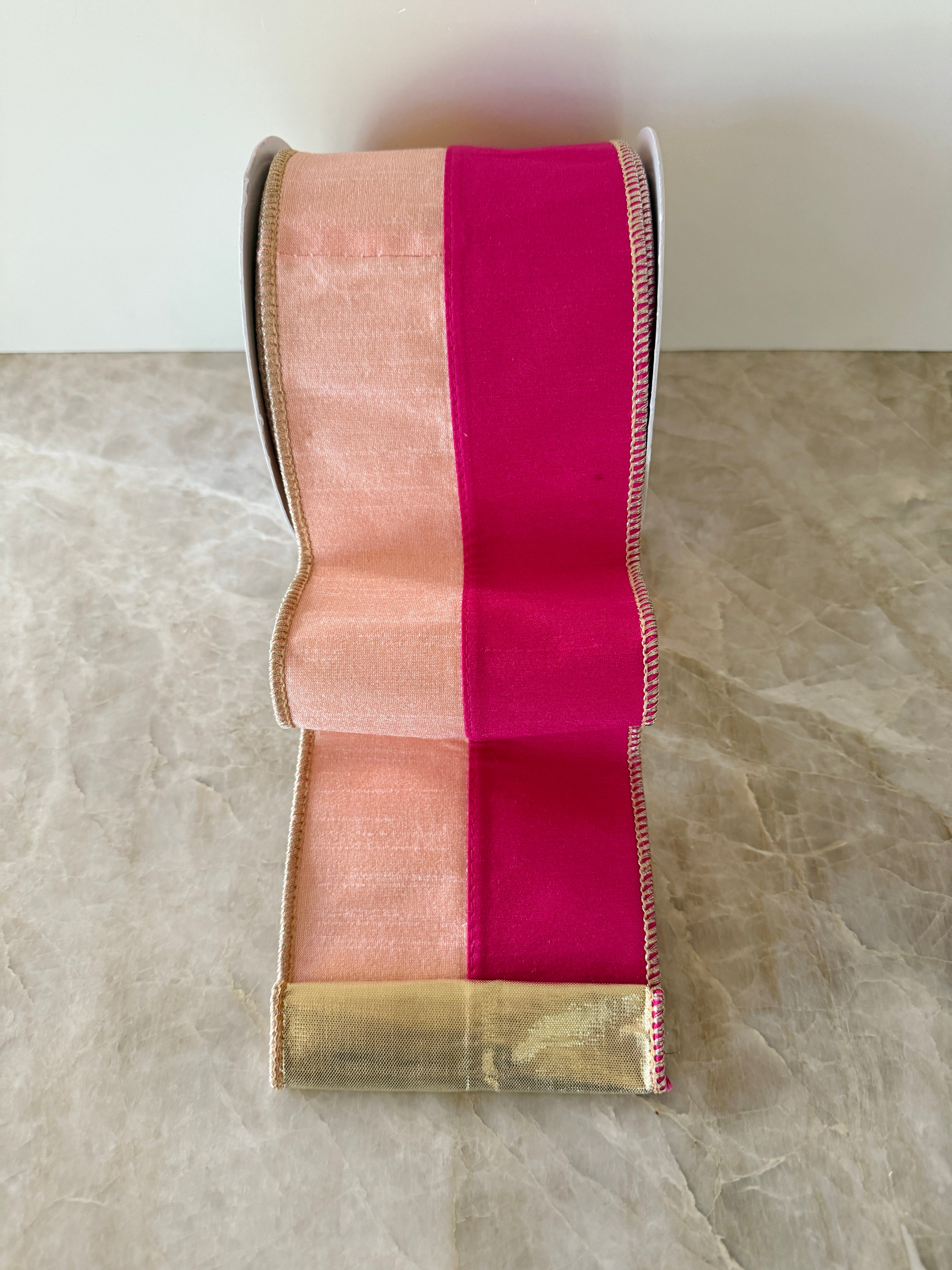Fuchsia and peach two tone wired ribbon by the roll with gold backing 4”x10 yards
