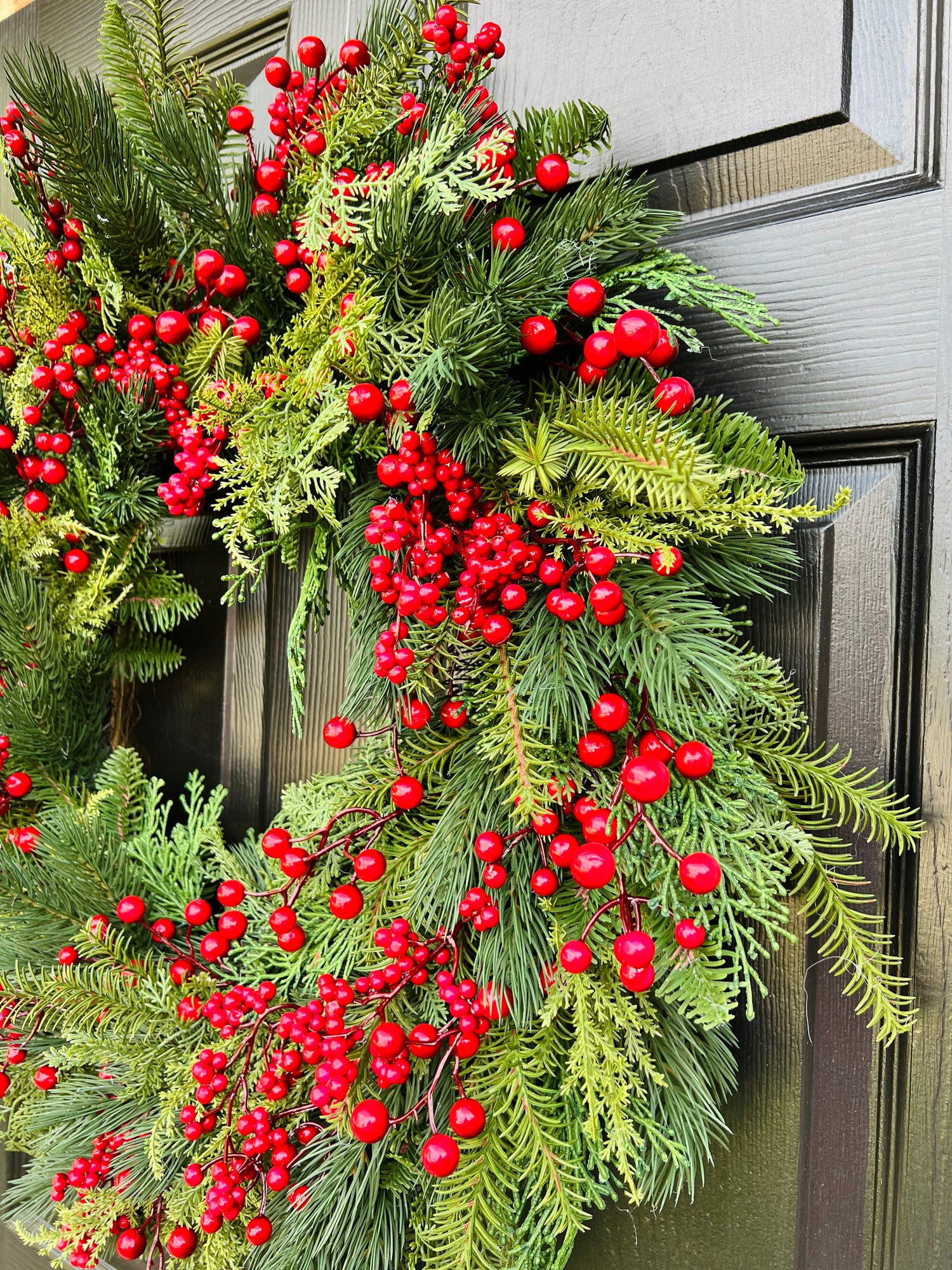 Holiday red berry and pinecone wreath 28”