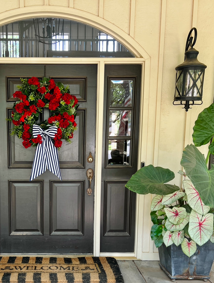 Red geranium and begonia wreath 30”