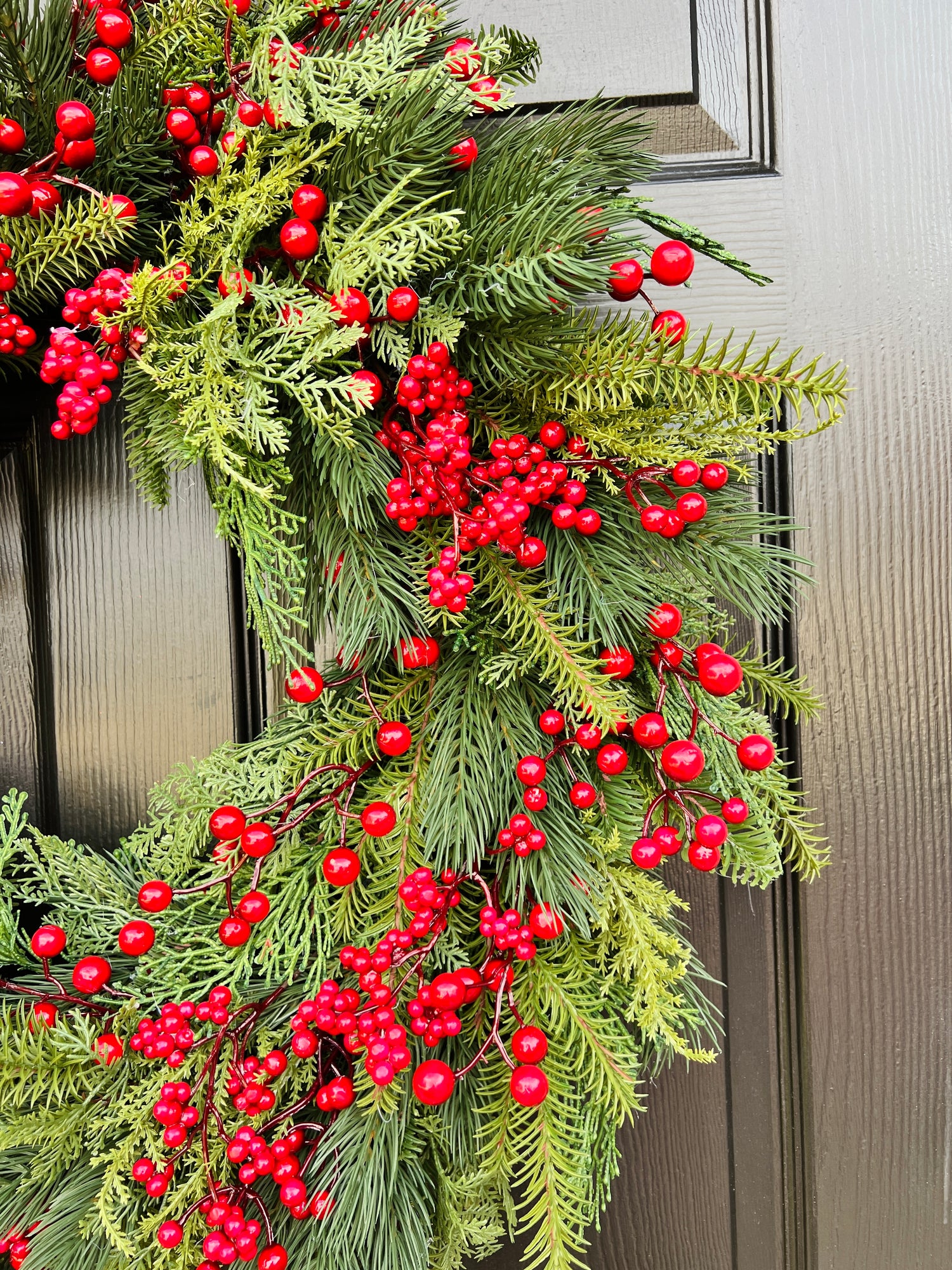 Holiday red berry and pinecone wreath 28”