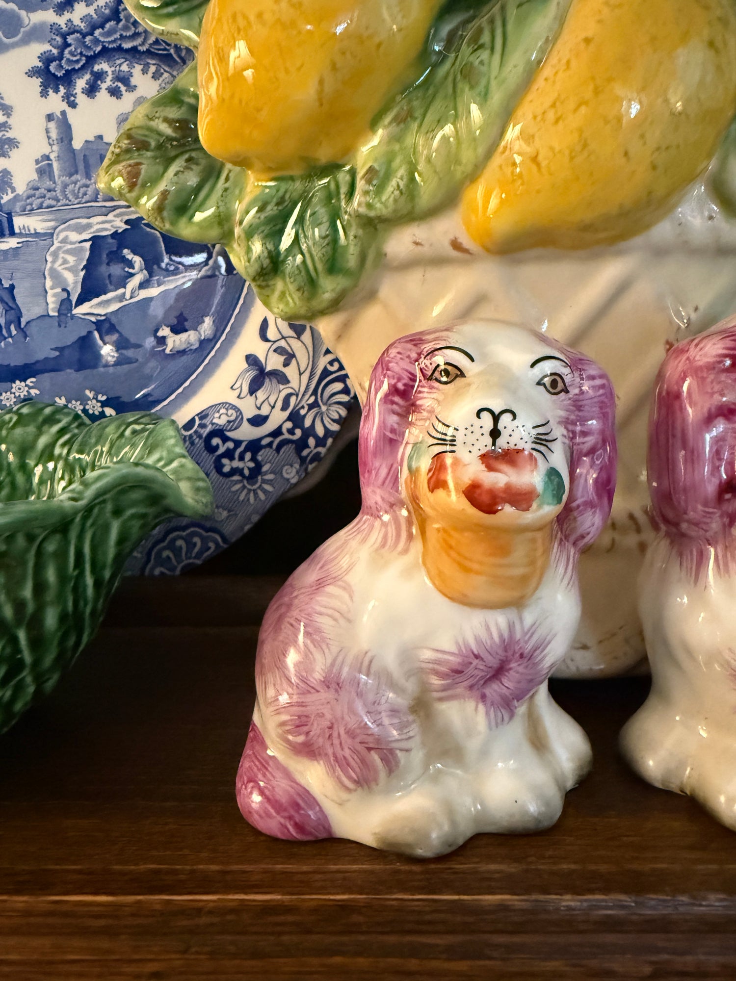 Mini pink porcelain Staffordshire dogs with flower baskets figurine pair
