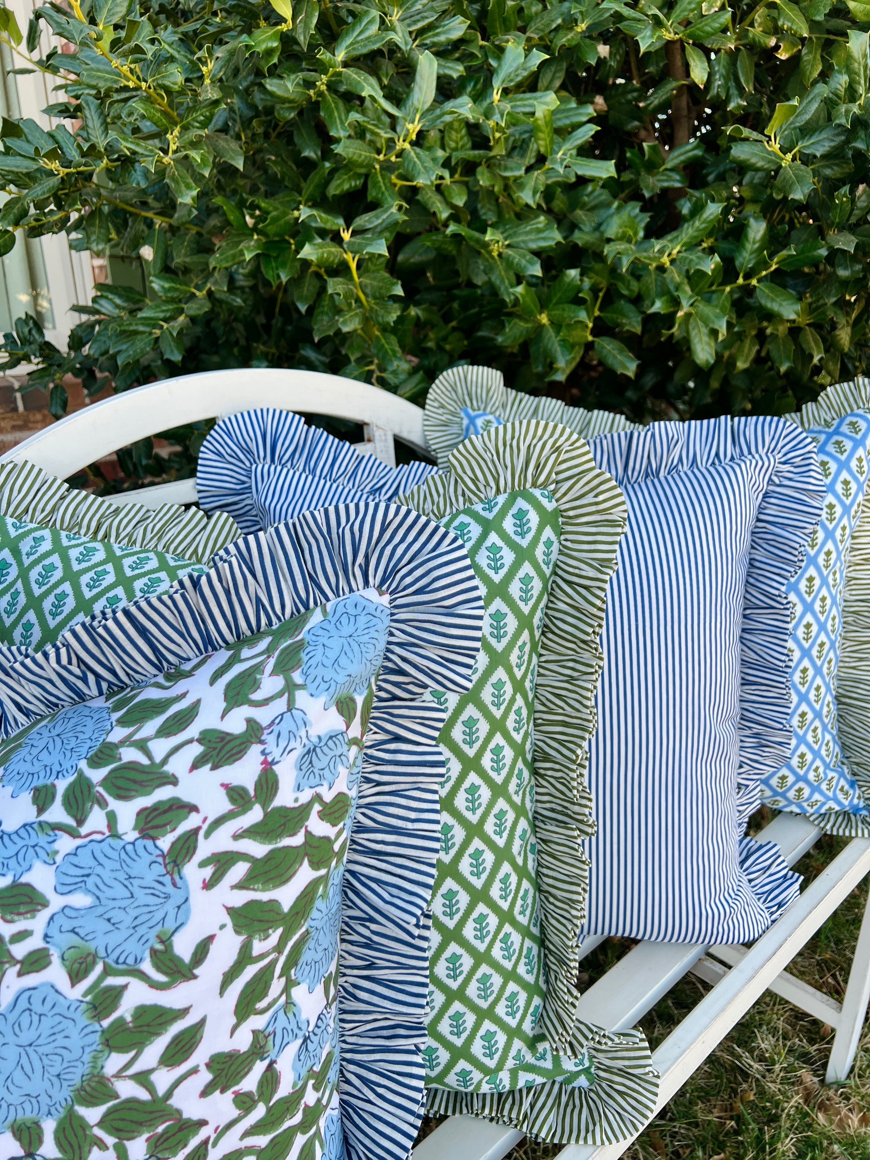 Blue and green floral block print pillow cover with ruffle trim