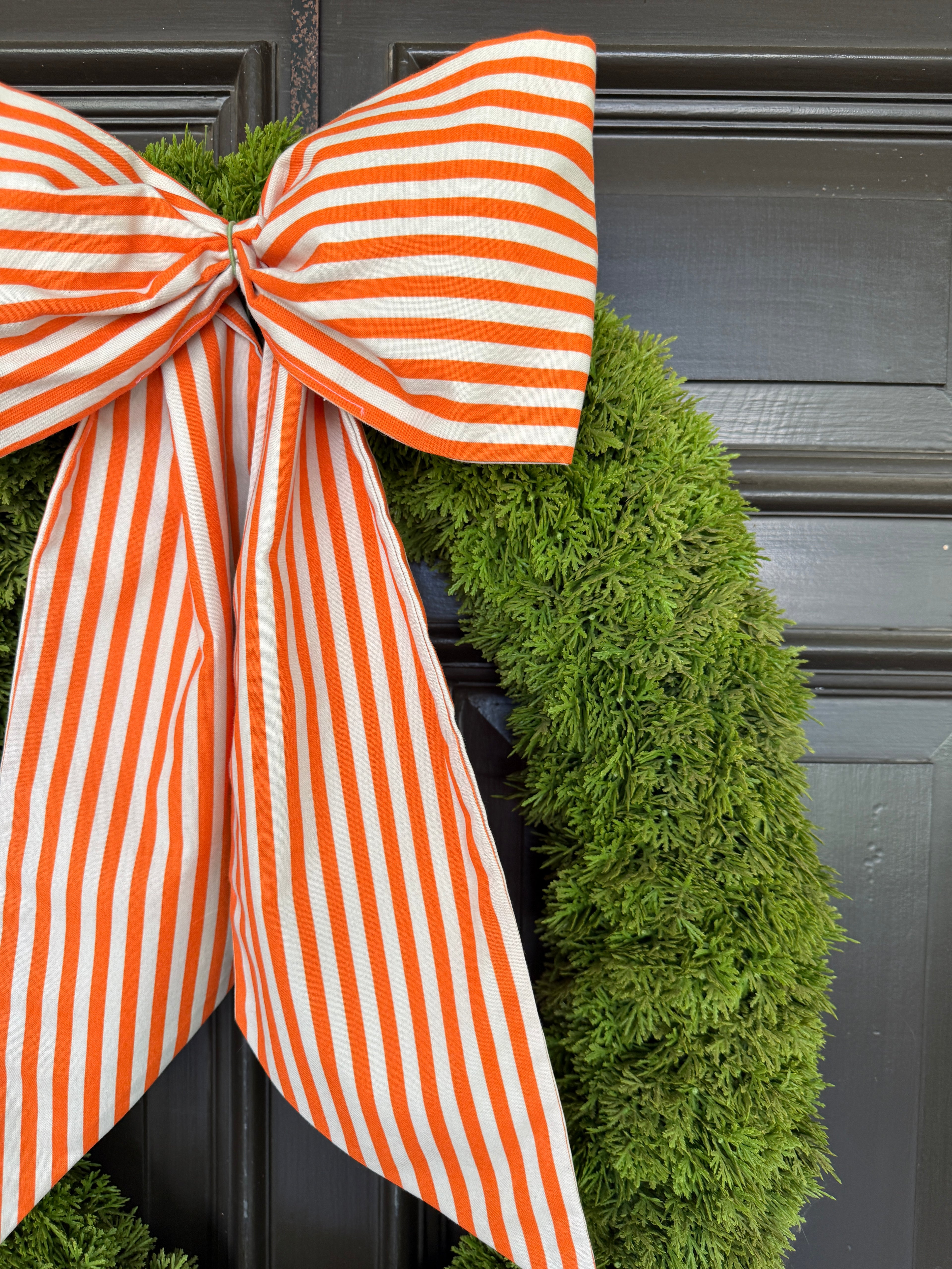 Orange striped signature wreath sash
