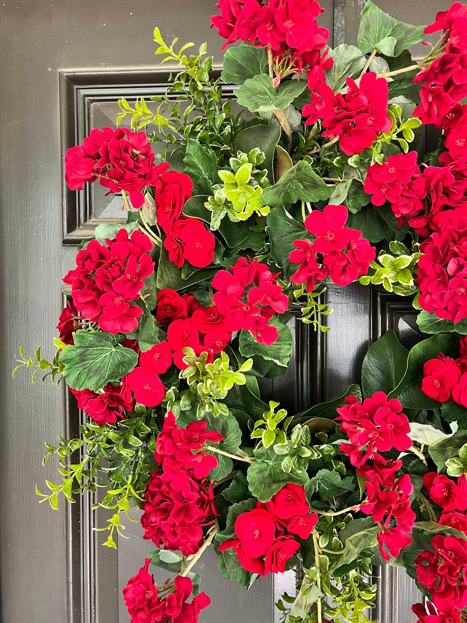 Red geranium and begonia wreath 30”