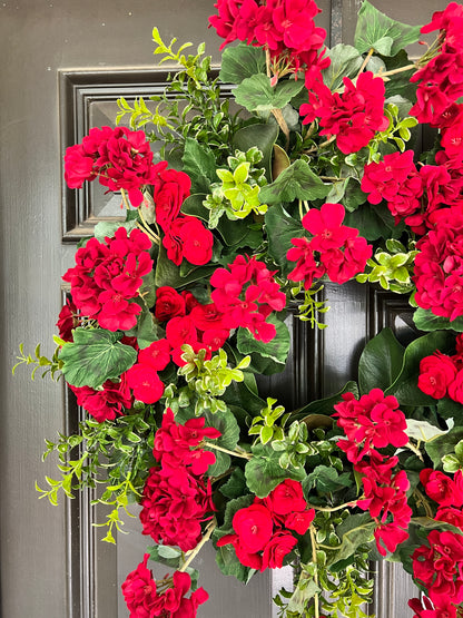 Red geranium and begonia wreath 30”