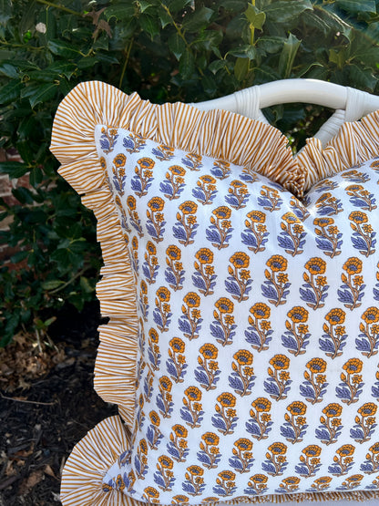 Yellow and blue floral block print pillow cover with ruffle trim