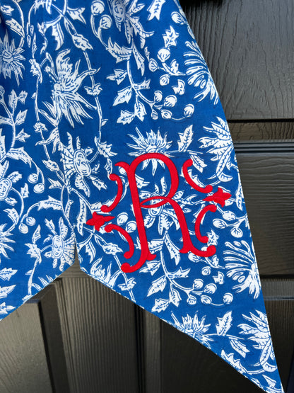 Blue and white block print wreath sash with contrast striped piping, monogram available