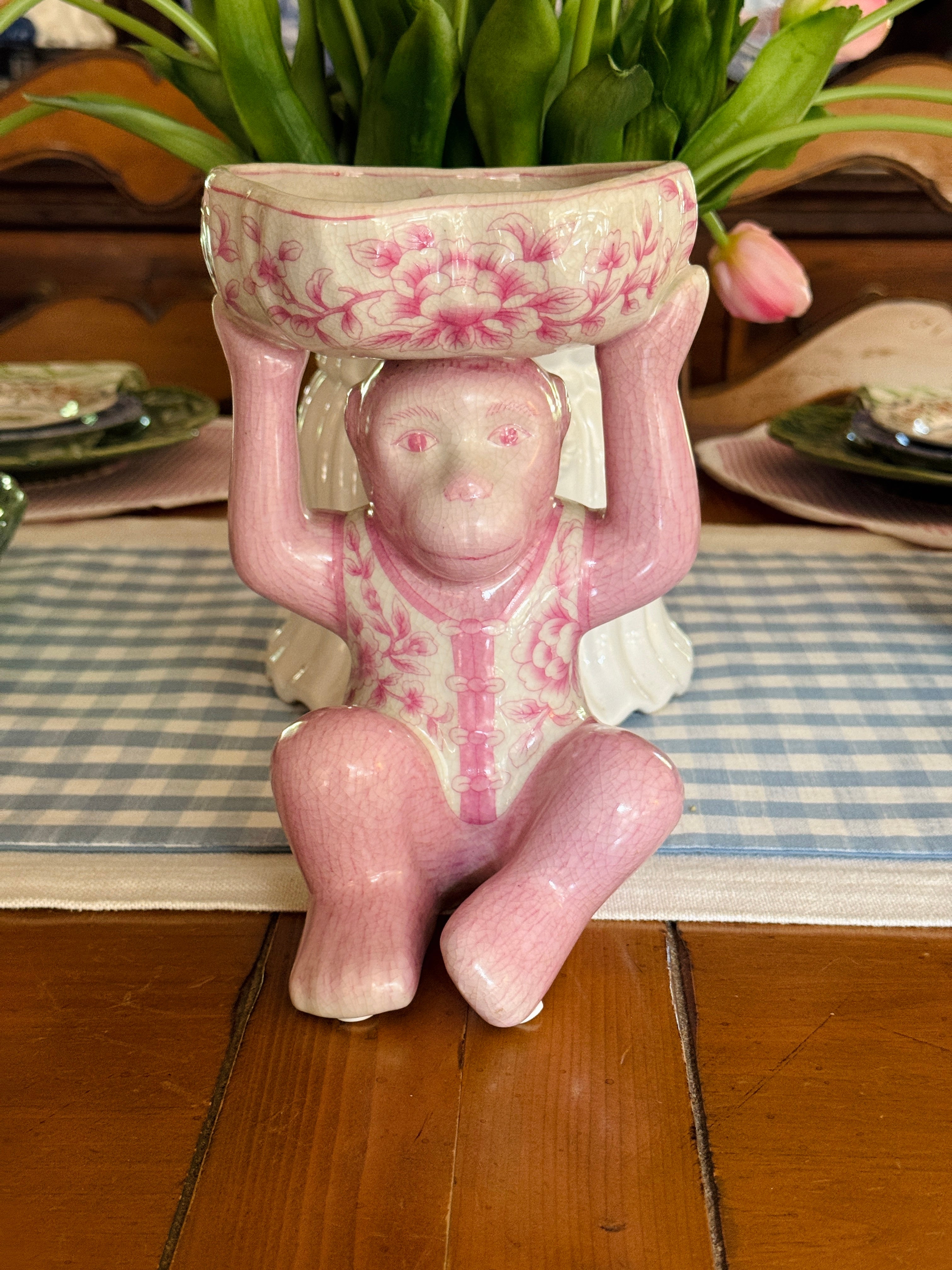 Pink porcelain chinoiserie monkey with lotus bowl