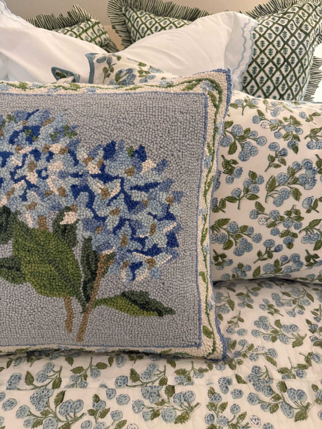 Blue hydrangea hooked wool pillow