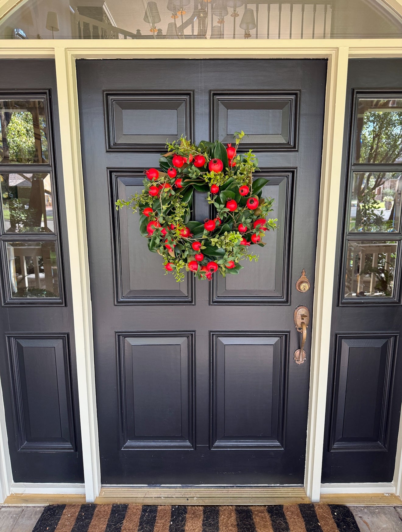 Pomegranate and greens wreath 24”