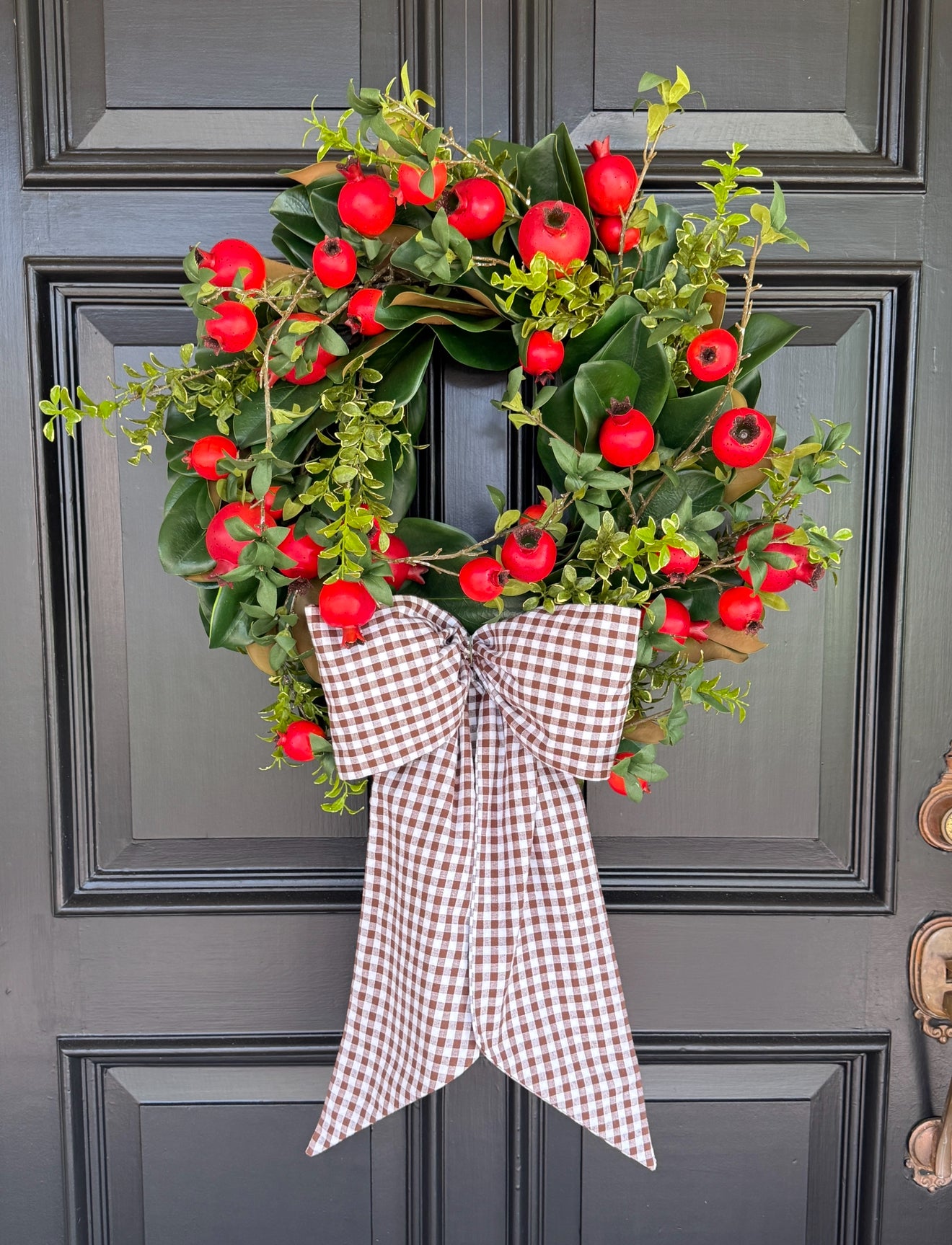 Pomegranate and greens wreath 24”