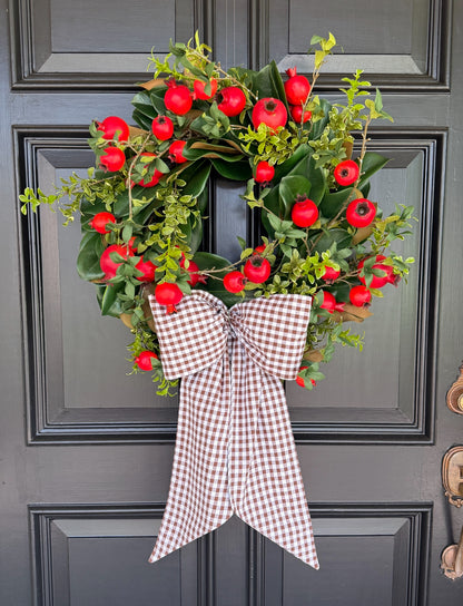 Pomegranate and greens wreath 24”