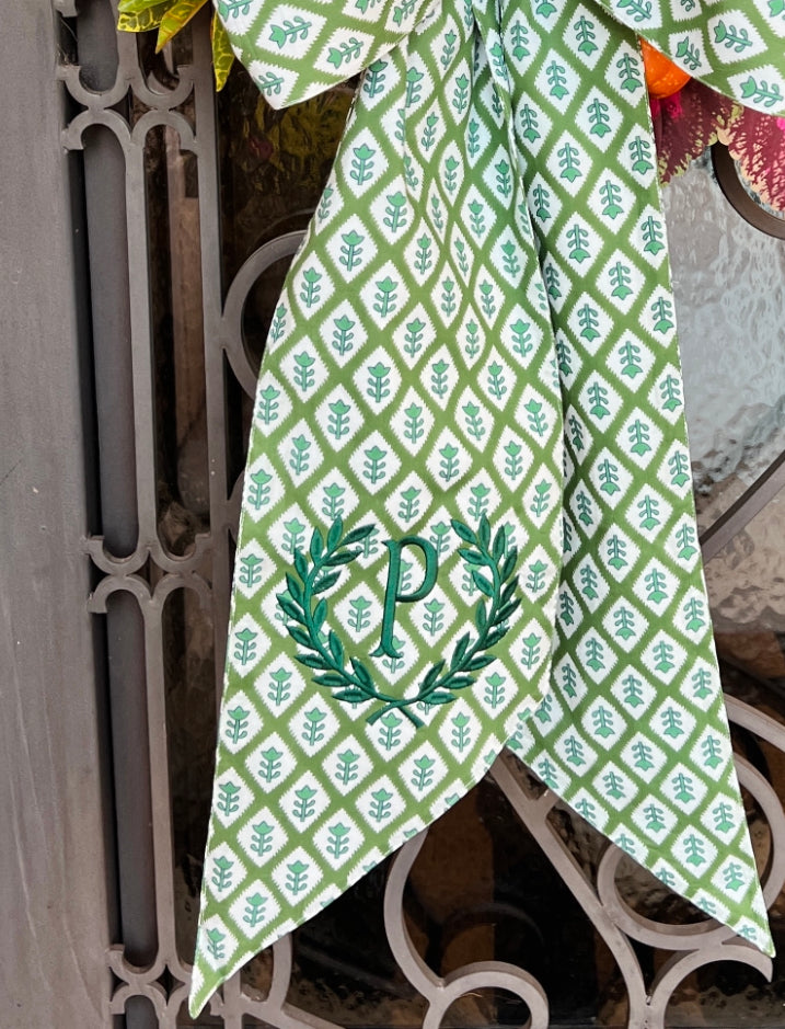 Green block print holiday tree topper bow