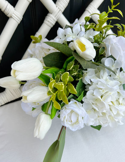 White rose and tulip floral arrangement in chinoiserie footed bowl