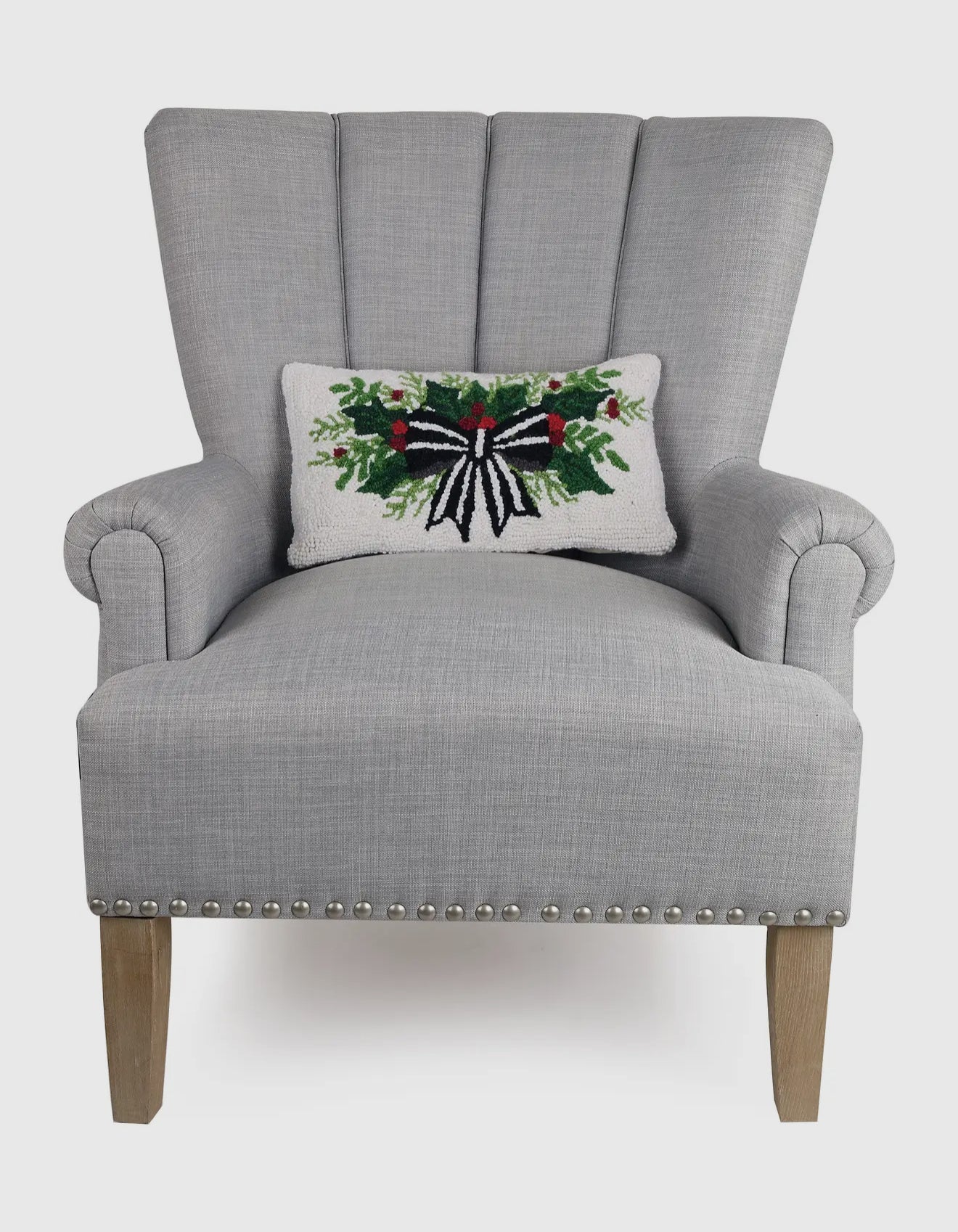 Holiday bow and holly hand hooked wool lumbar pillow