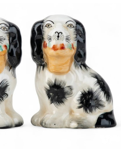 Mini black porcelain Staffordshire dogs with flower baskets figurine pair