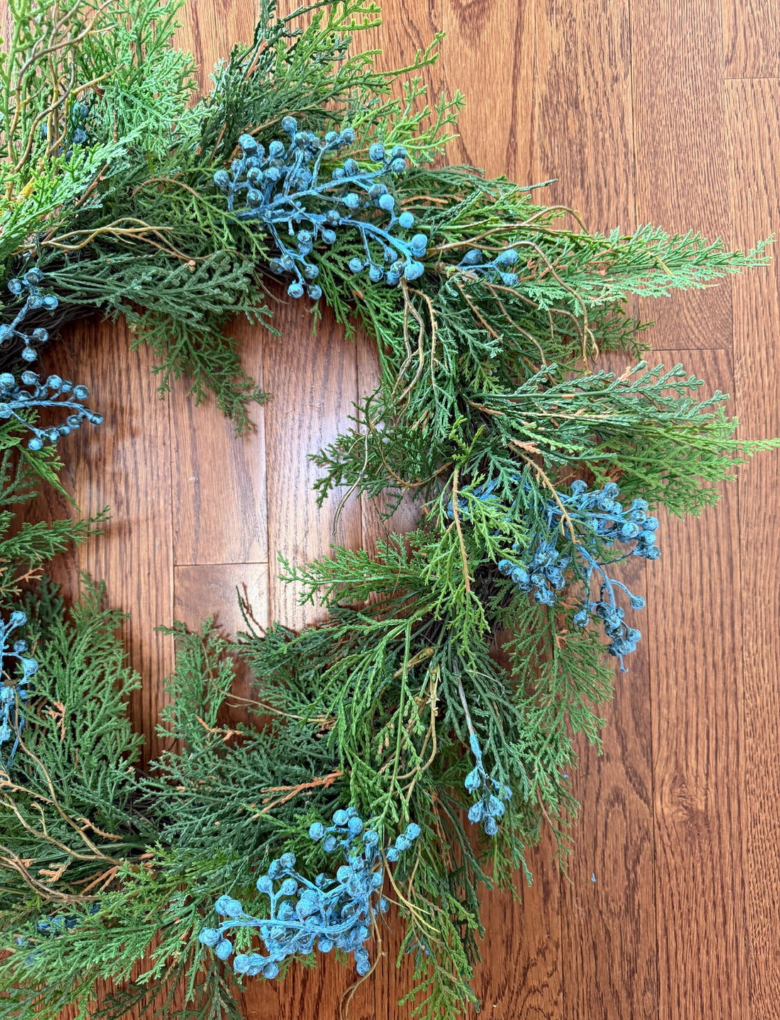 Fresh looking faux juniper wreath 22”