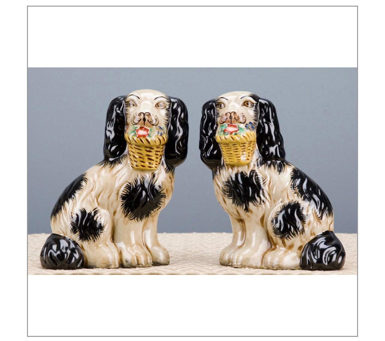 Staffordshire dog pair with flower baskets- black