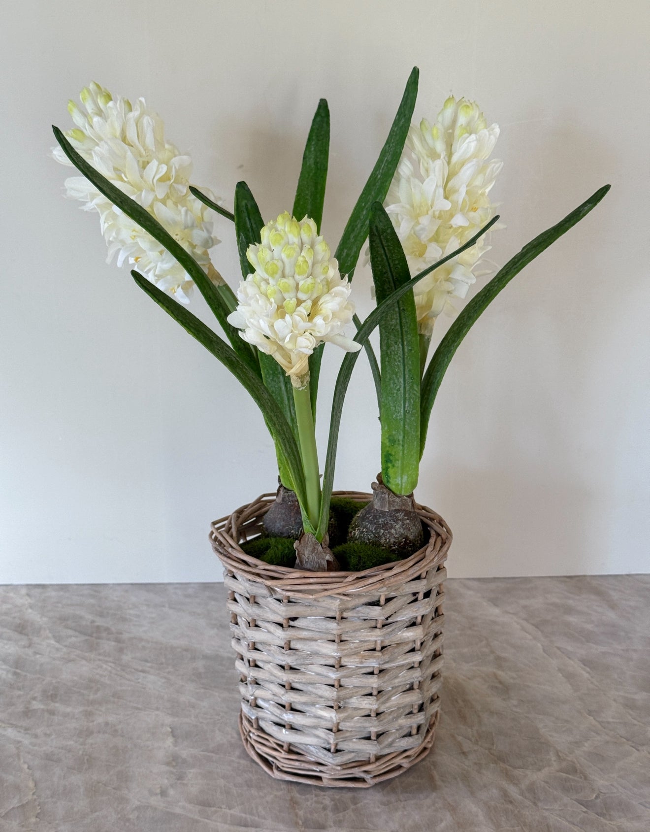 Faux Hyacinth bulbs in wicker basket