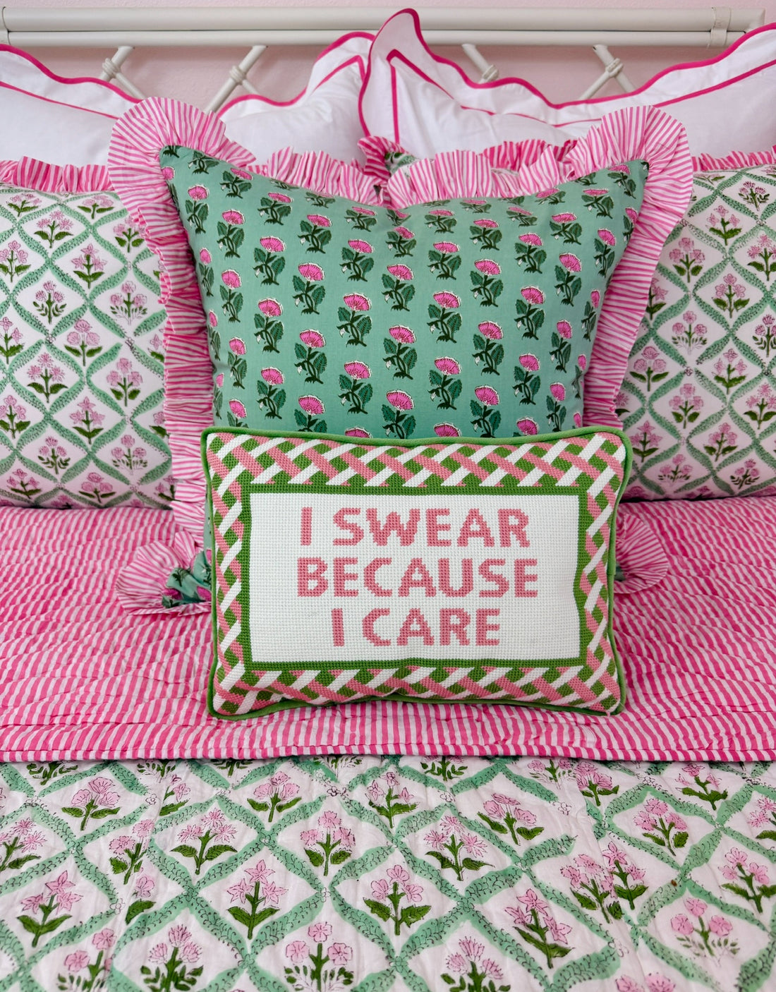 Needlepoint pillow, pink and green “I swear because I care”