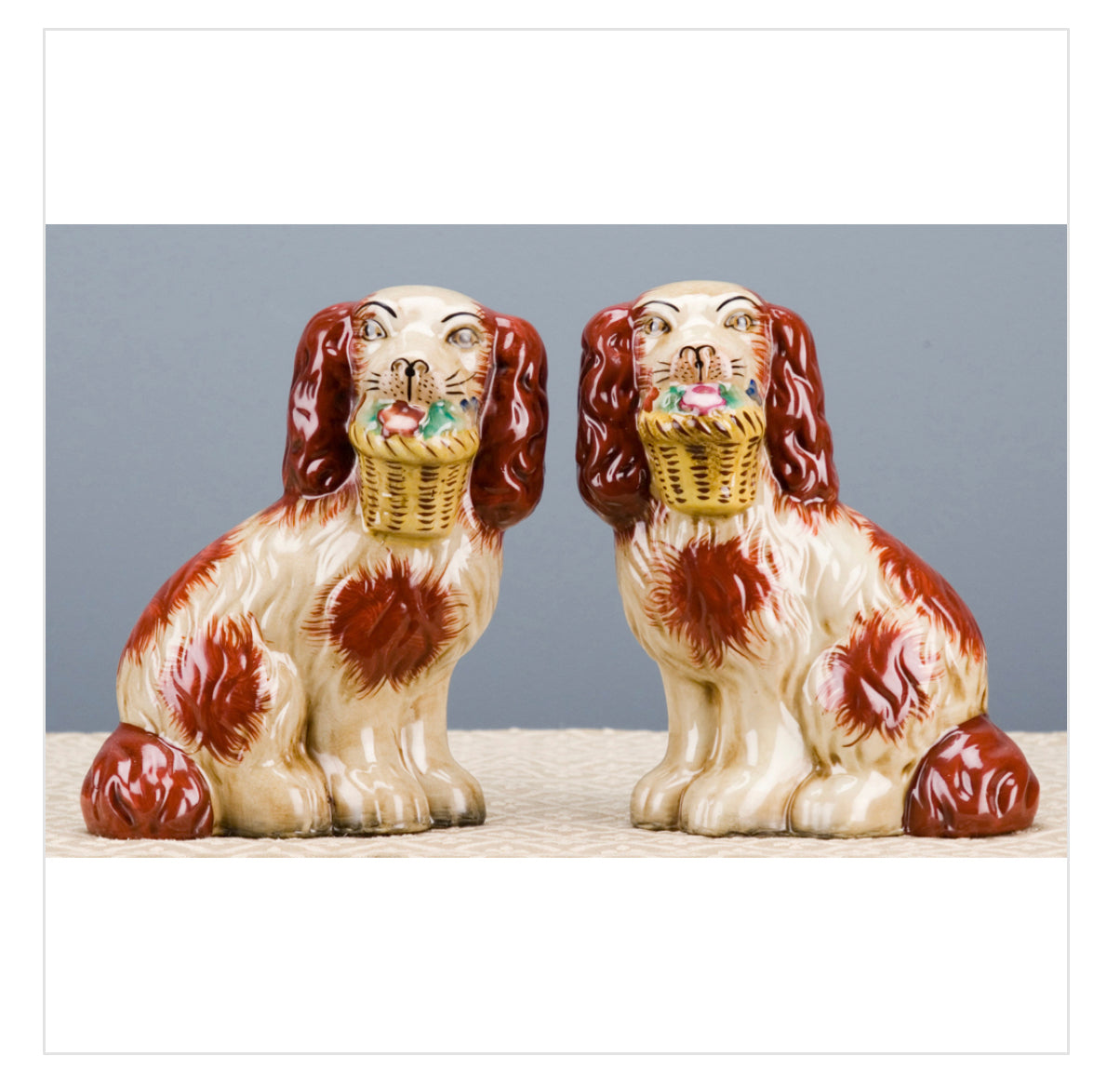 Staffordshire dog pair with flower baskets- rust