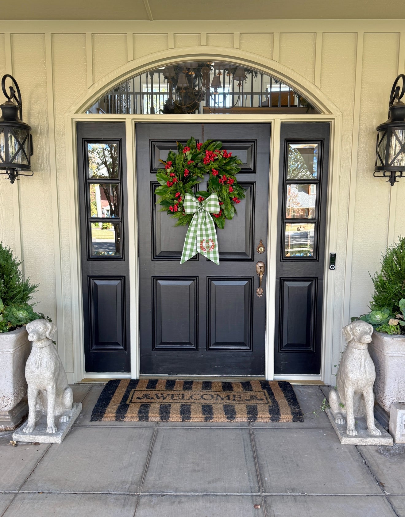 Red berry, cedar, and magnolia leaf wreath 27”