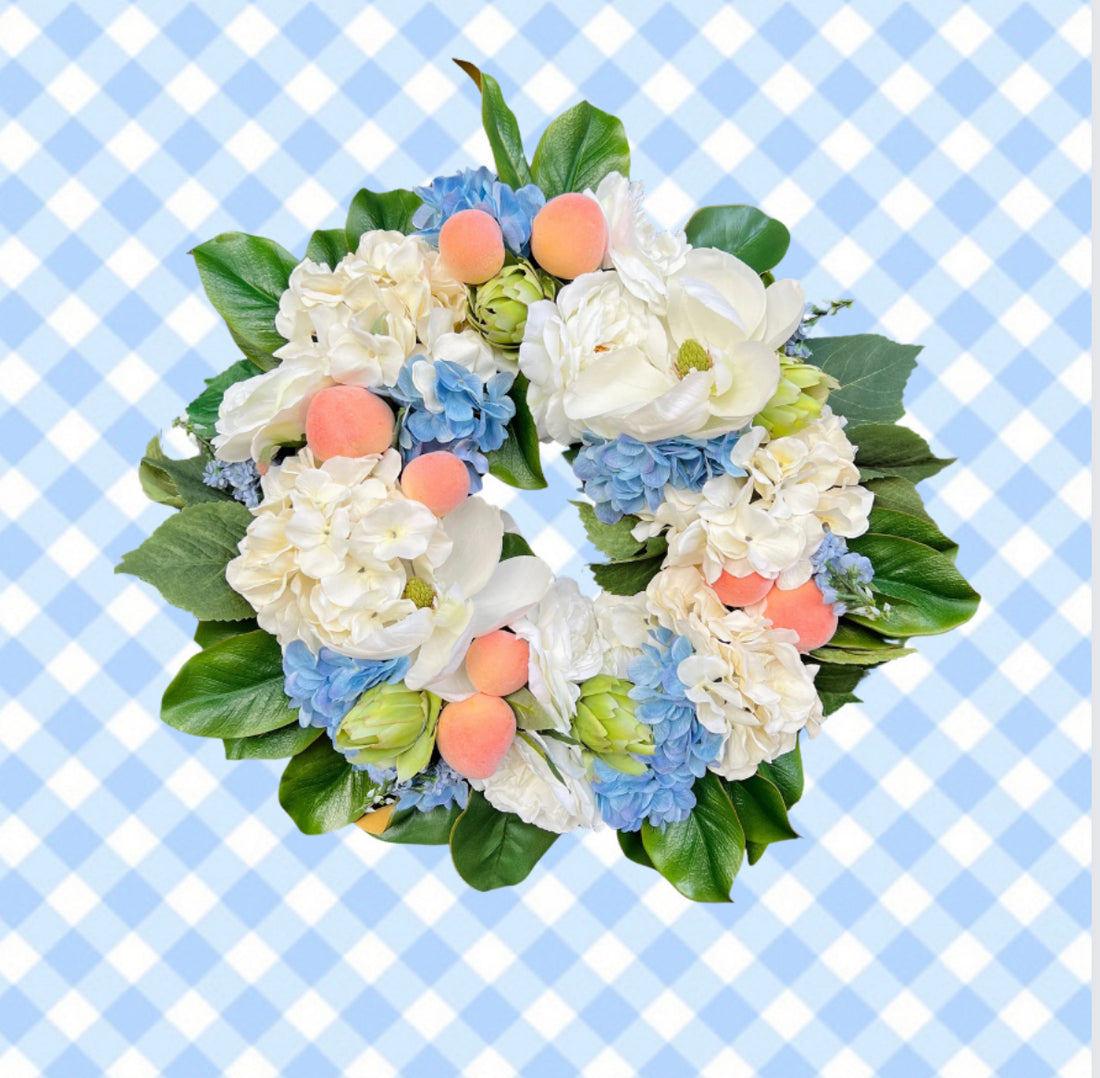 Southern magnolia, peach, and blue hydrangea Summer wreath