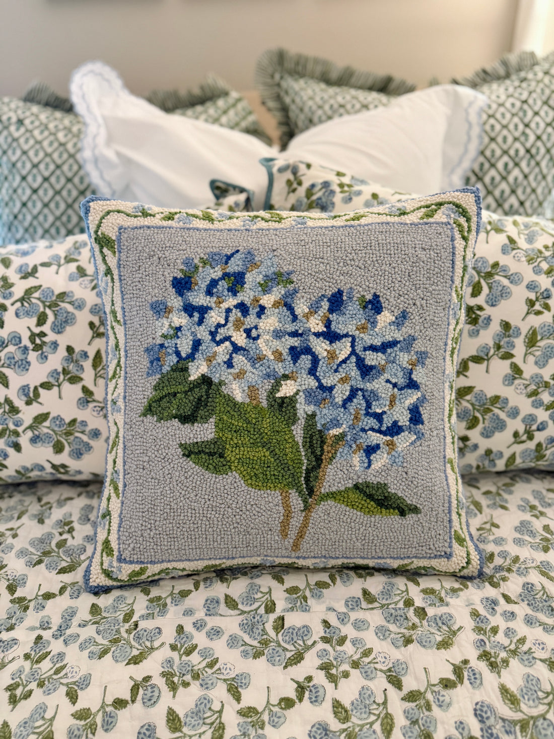 Blue hydrangea hooked wool pillow