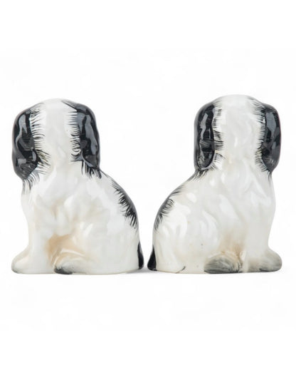Mini black porcelain Staffordshire dogs with flower baskets figurine pair