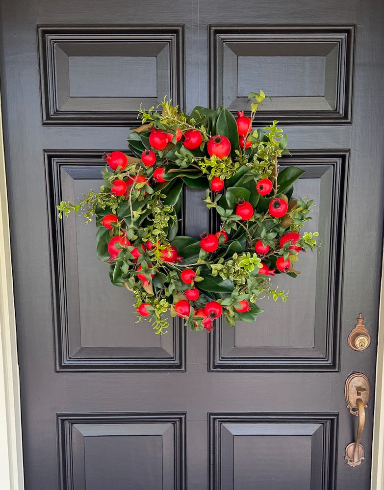Pomegranate and greens wreath 24”