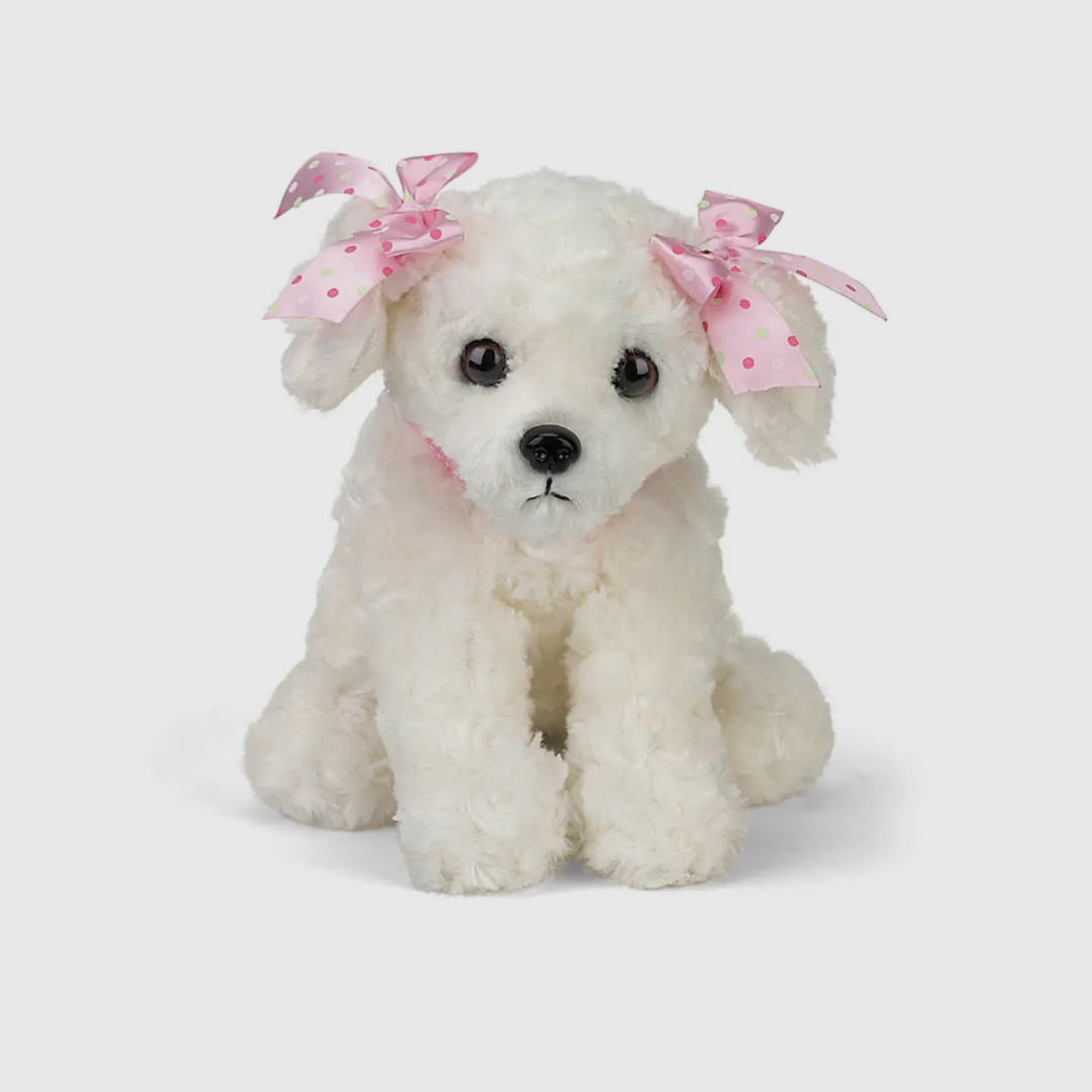Adorable white plush dog with pink bows