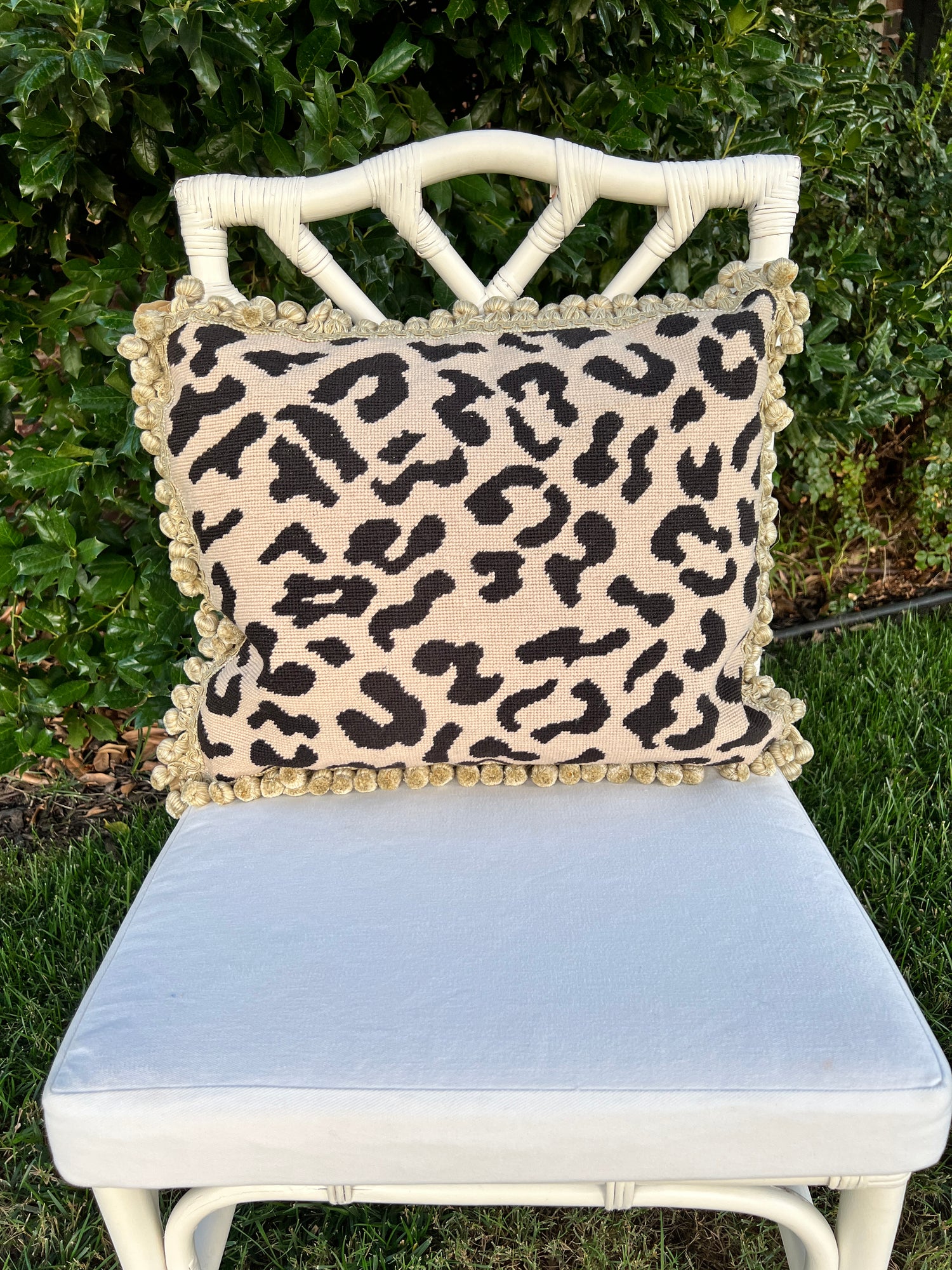 Beige and black leopard needlepoint throw pillow