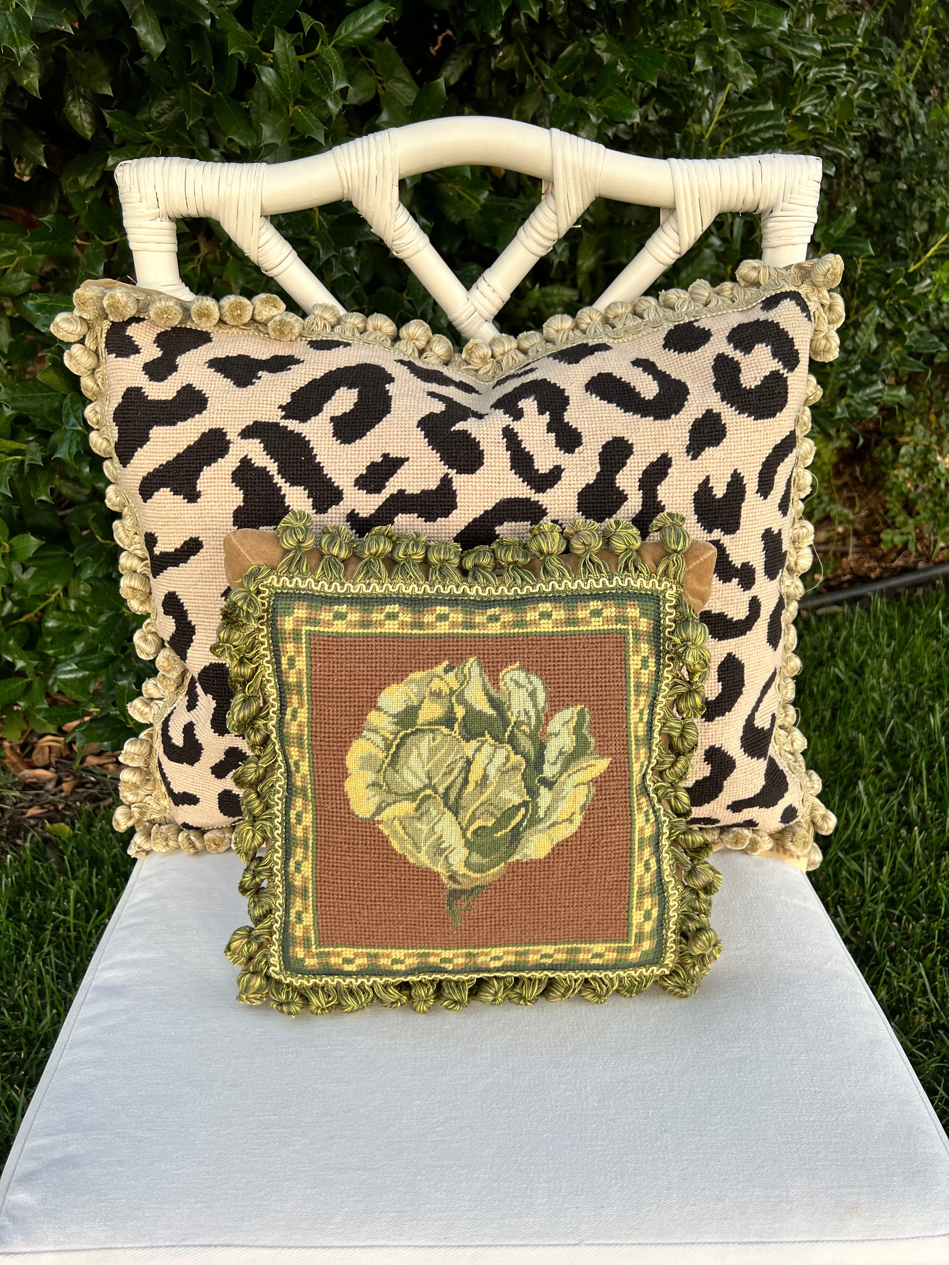 Beige and black leopard needlepoint throw pillow