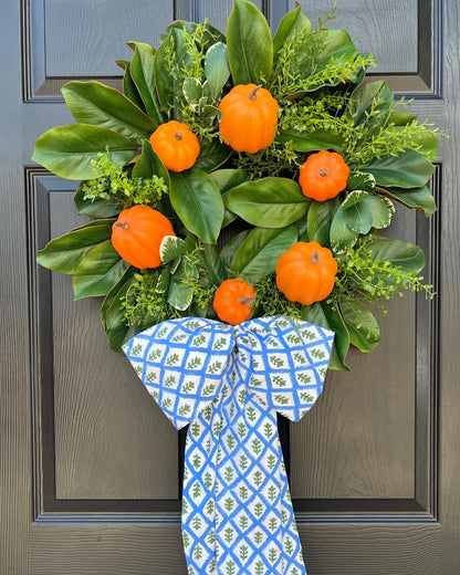 Fall orange pumpkin and magnolia wreath with optional French blue ribbons