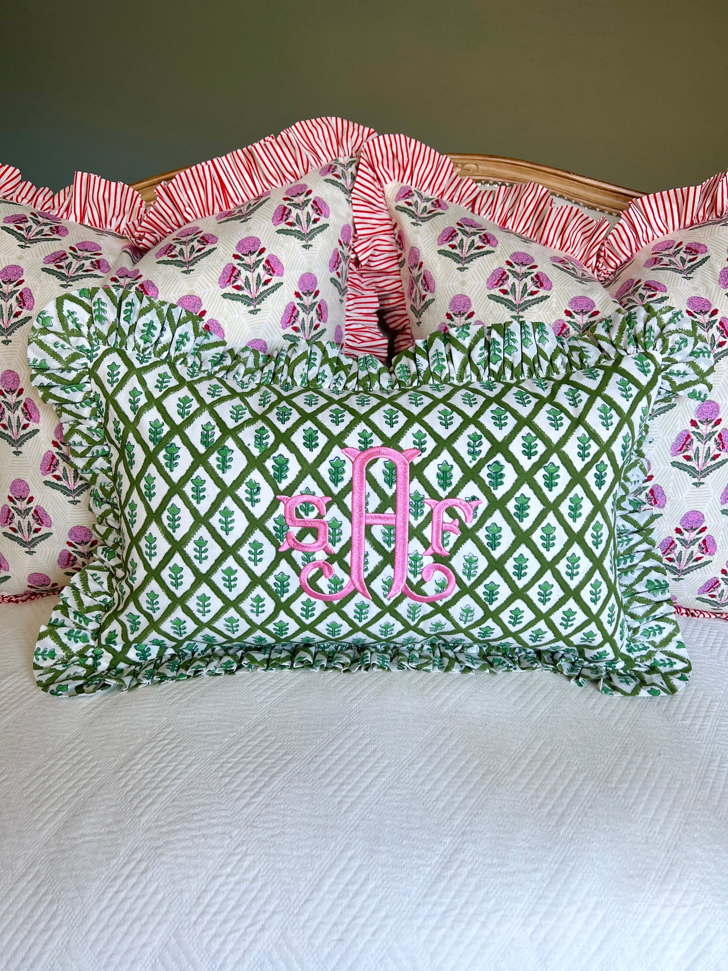 Pink and red floral block print ruffle pillow